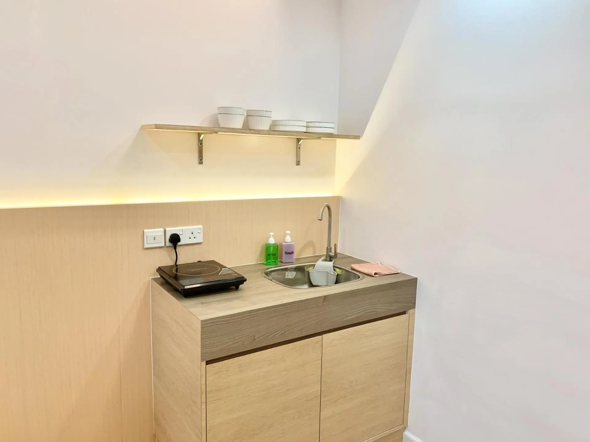 Kitchen or kitchenette in Deco Home @ Aru Suites