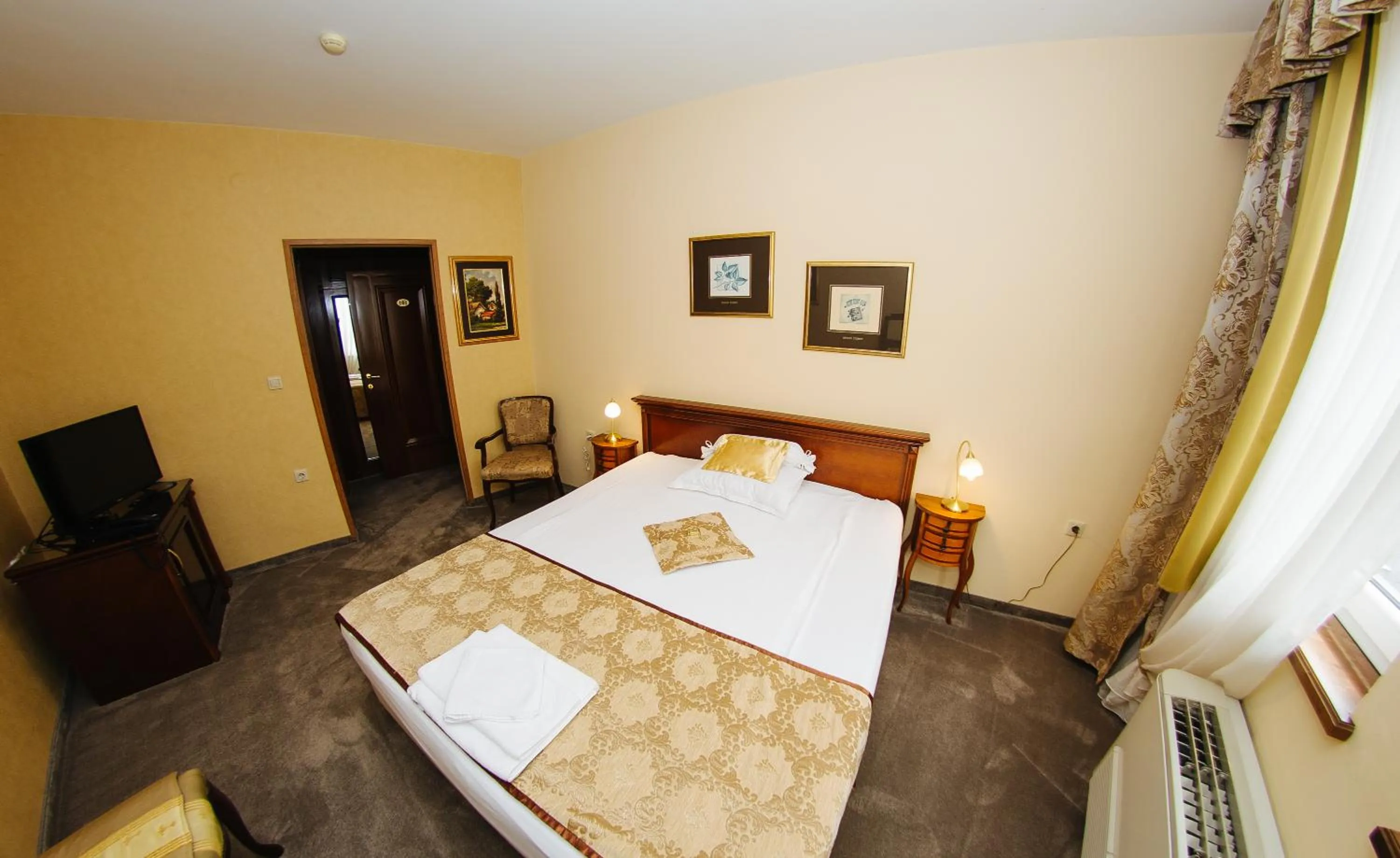 Bed in Garni Hotel Andric