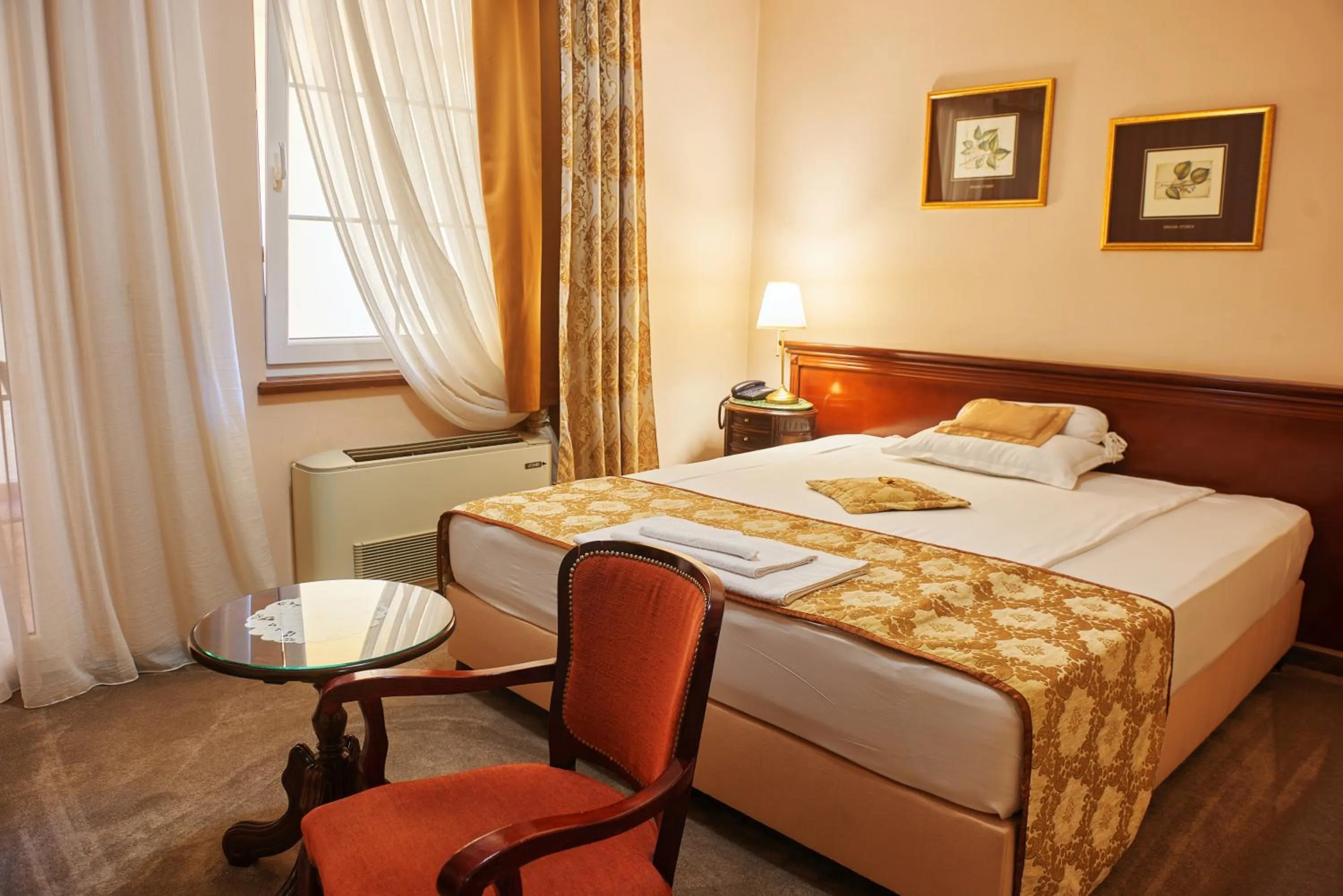 Bed in Garni Hotel Andric