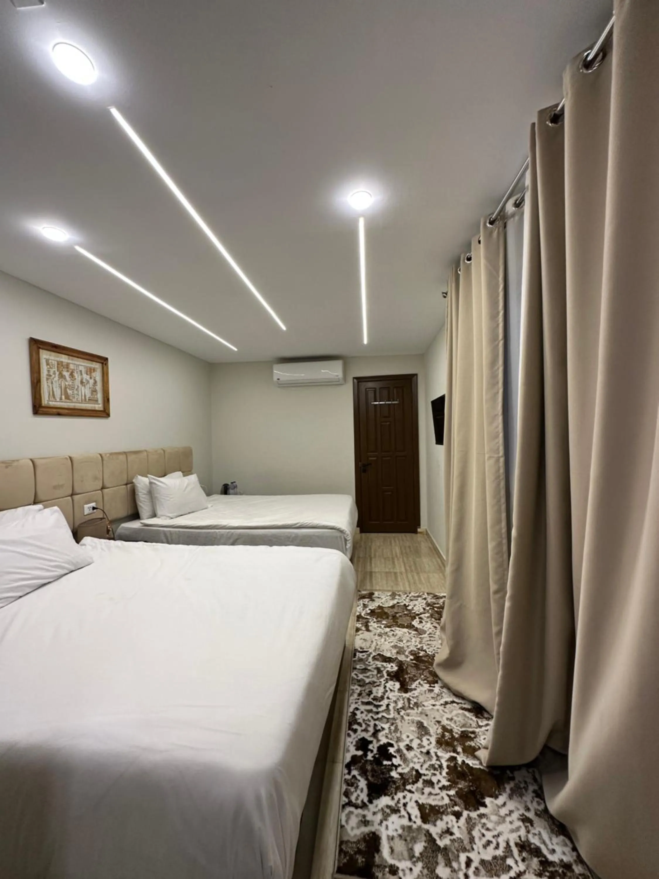 Bed in Crowne Pyramids View inn