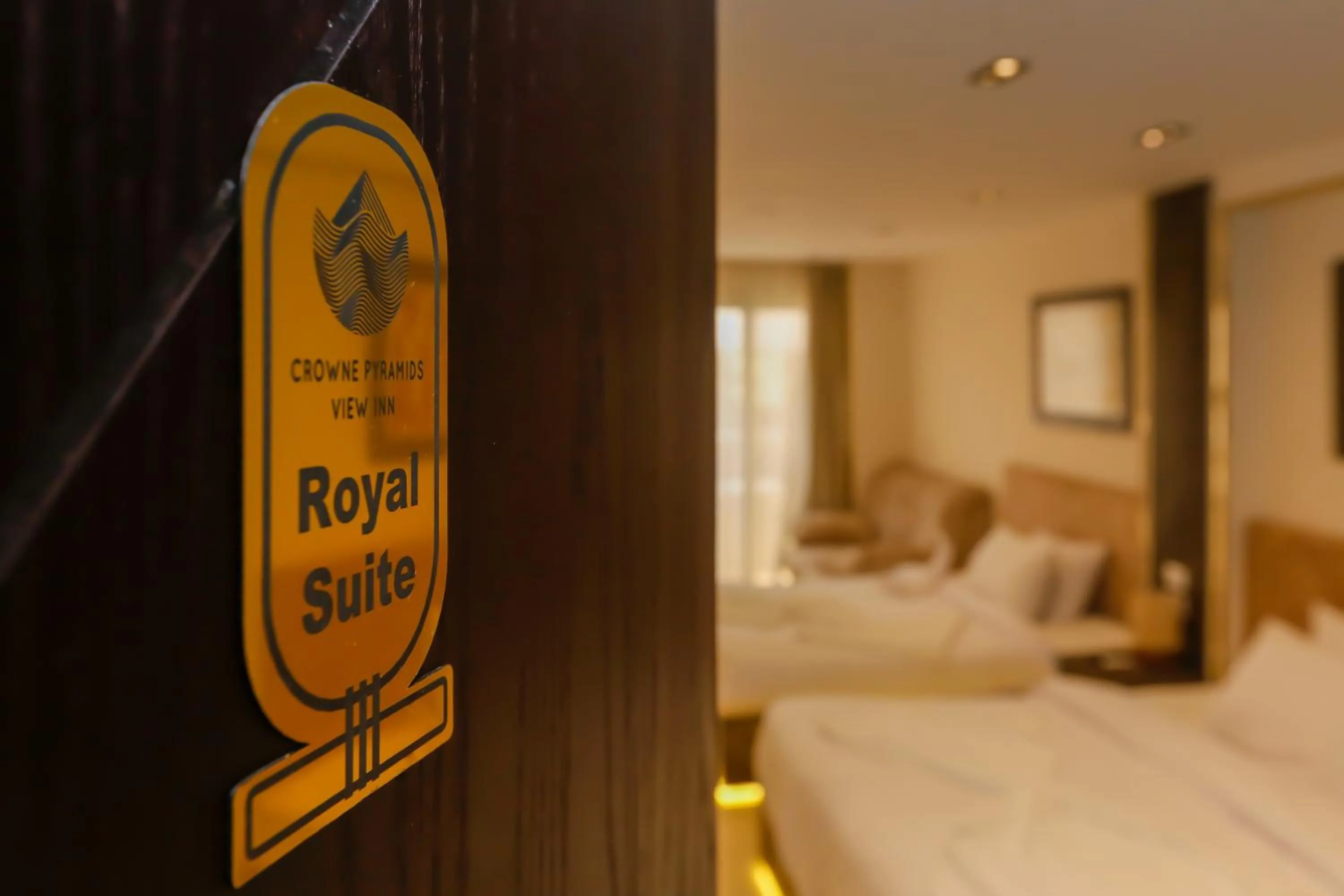 Logo/Certificate/Sign, Bed in Crowne Pyramids View inn
