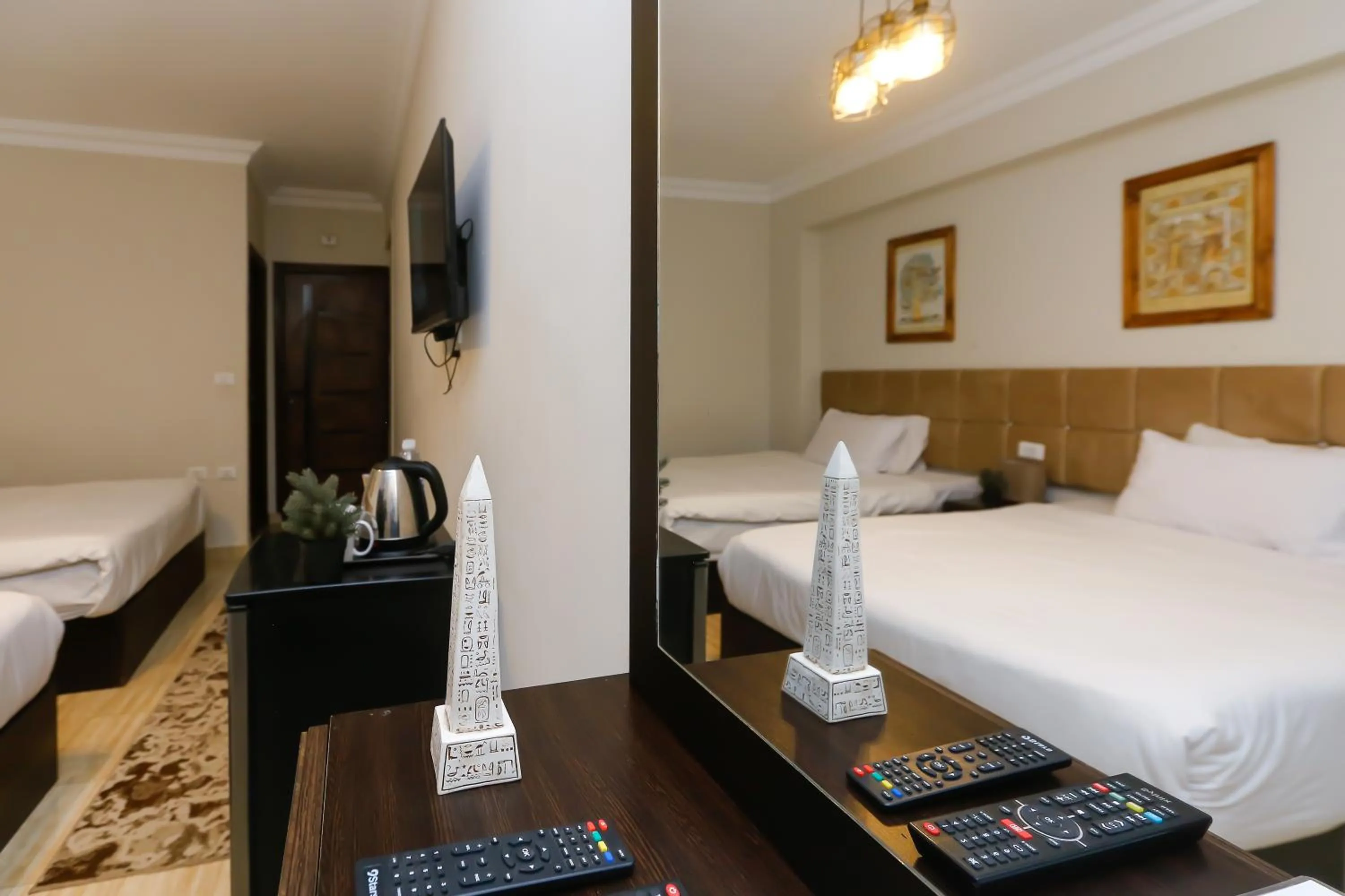 Bed in Crowne Pyramids View inn