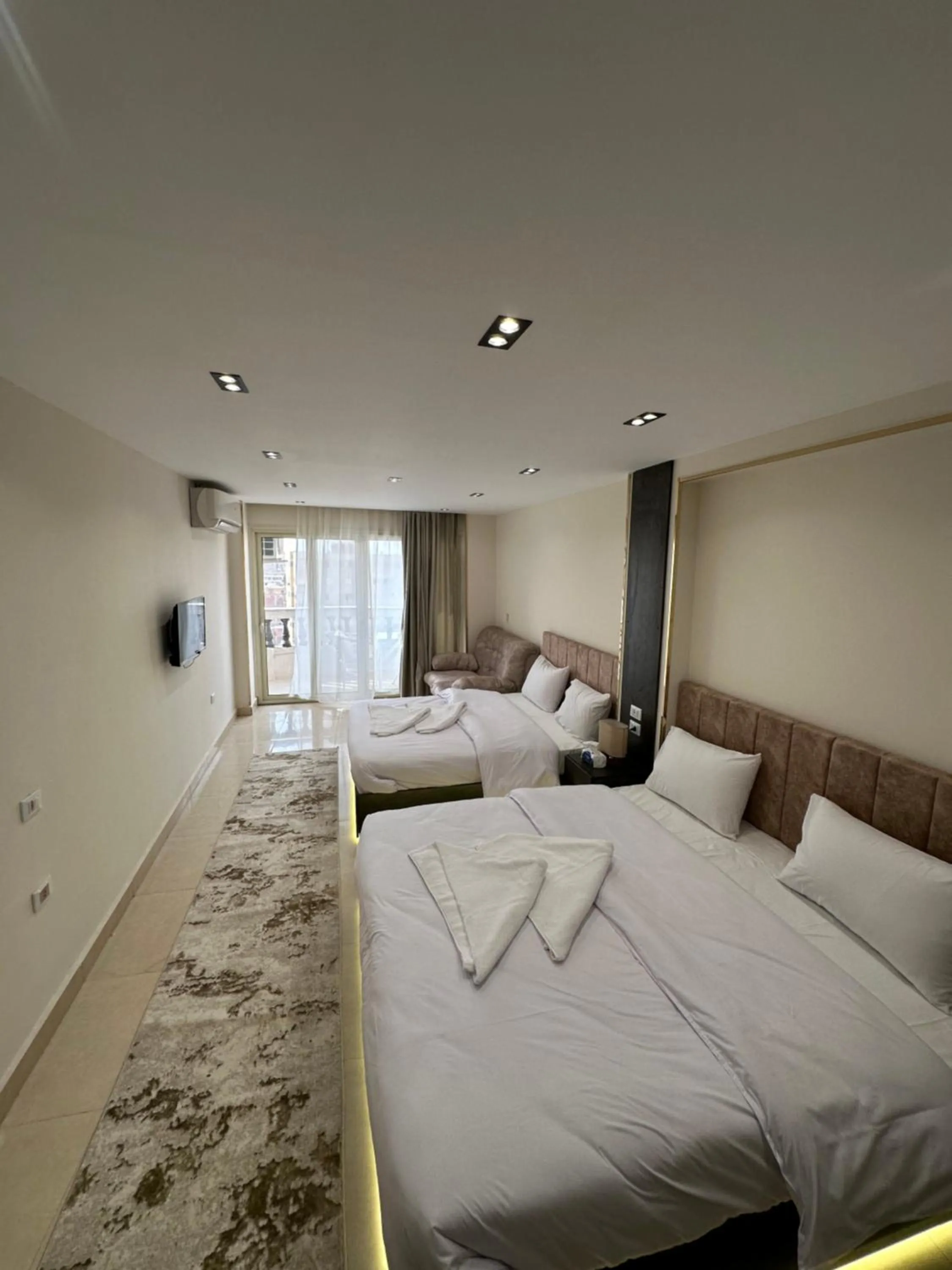 Bed in Crowne Pyramids View inn