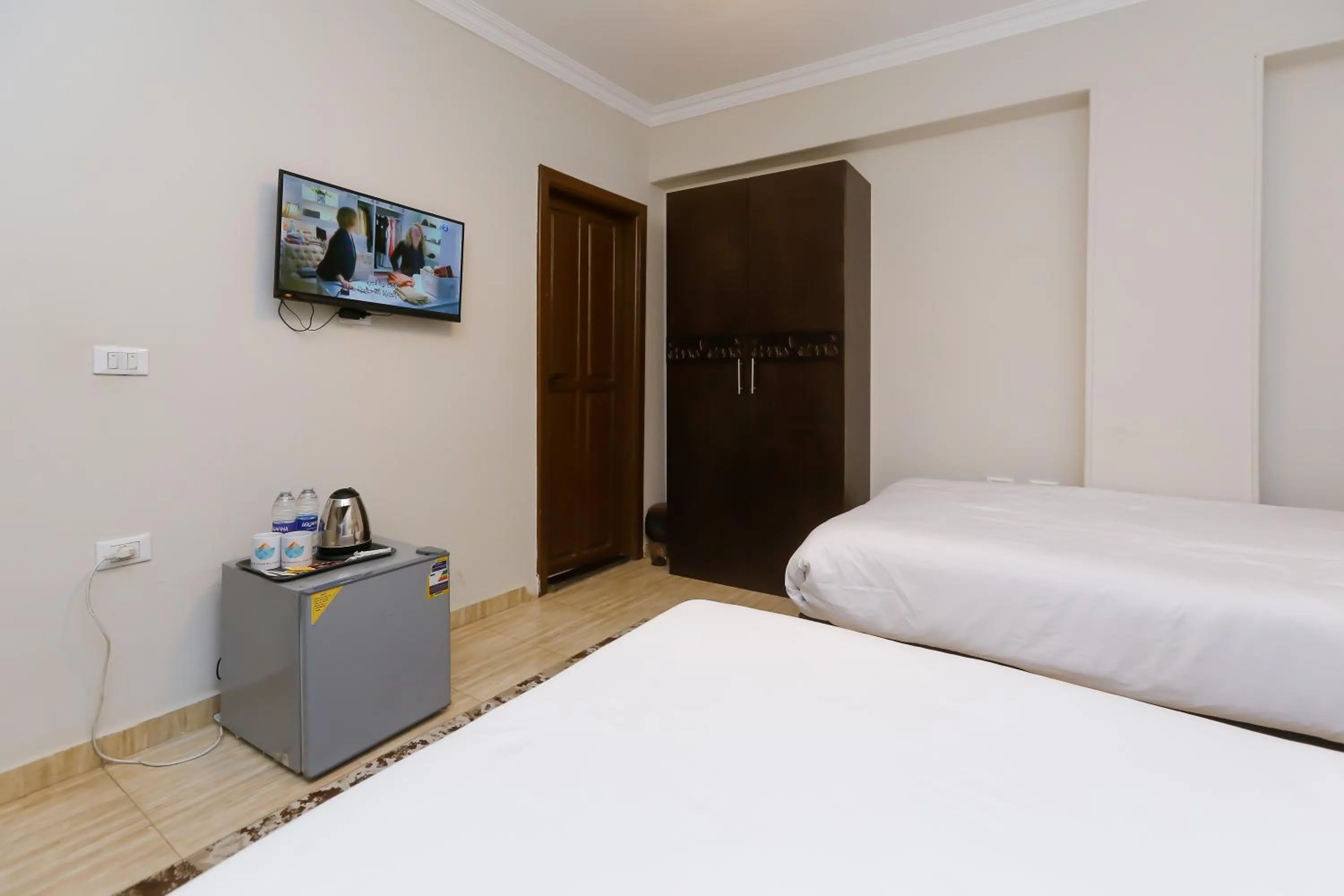 Bed in Crowne Pyramids View inn