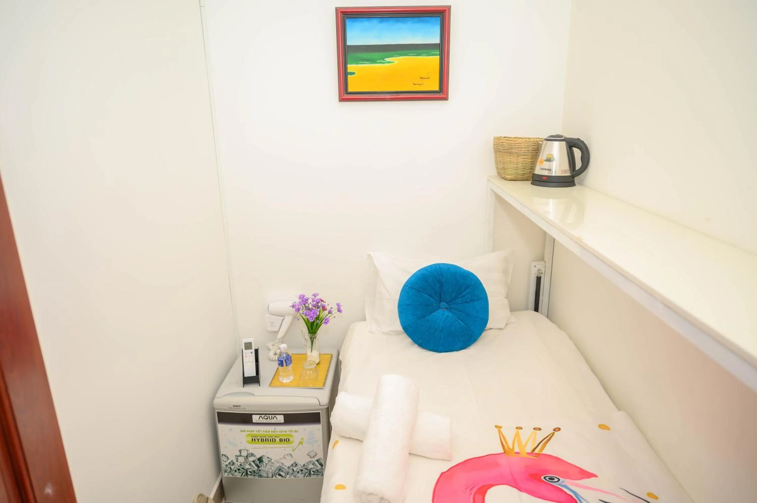 Bed in Jasmine Hotel