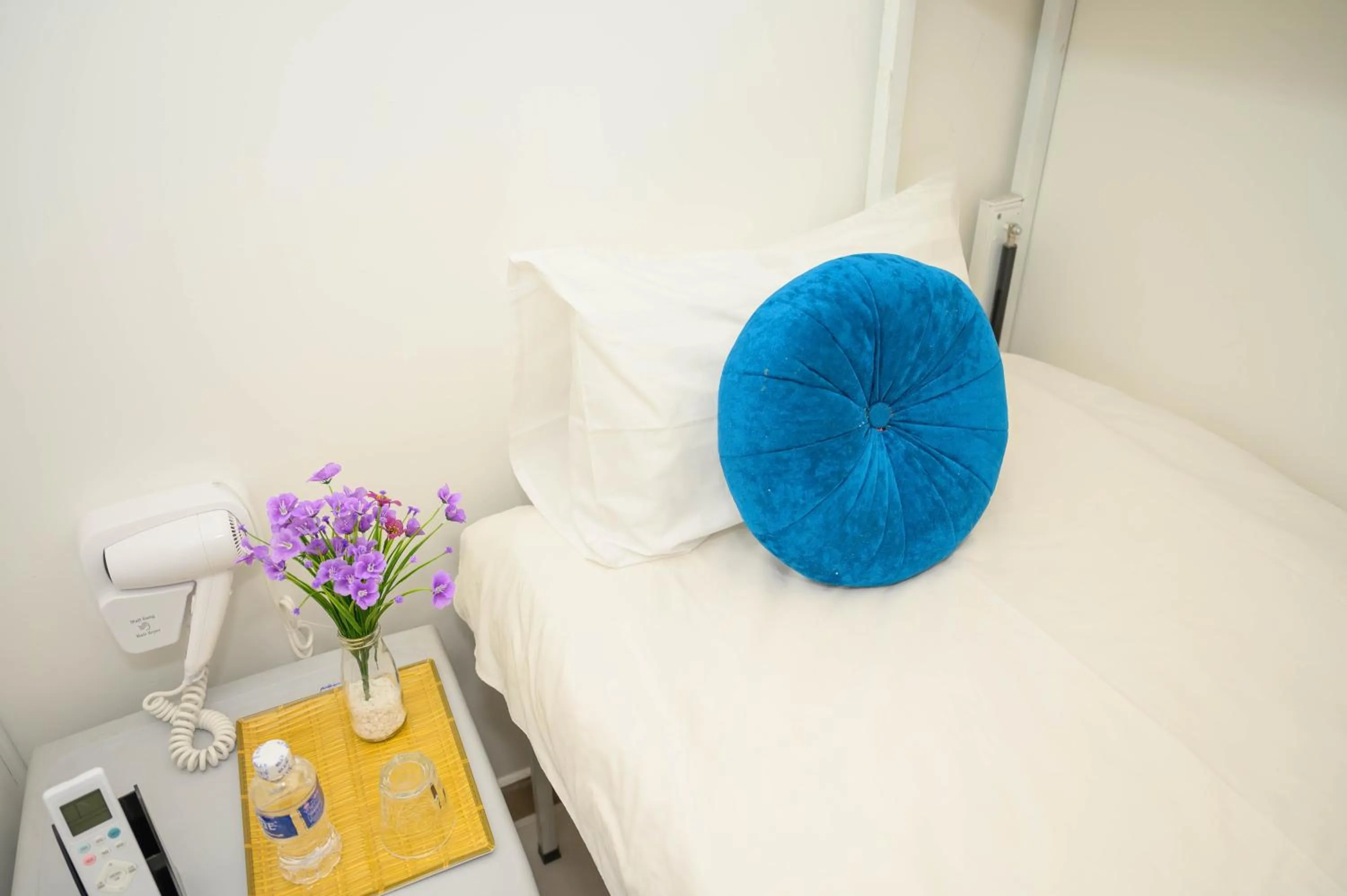 Bed in Jasmine Hotel