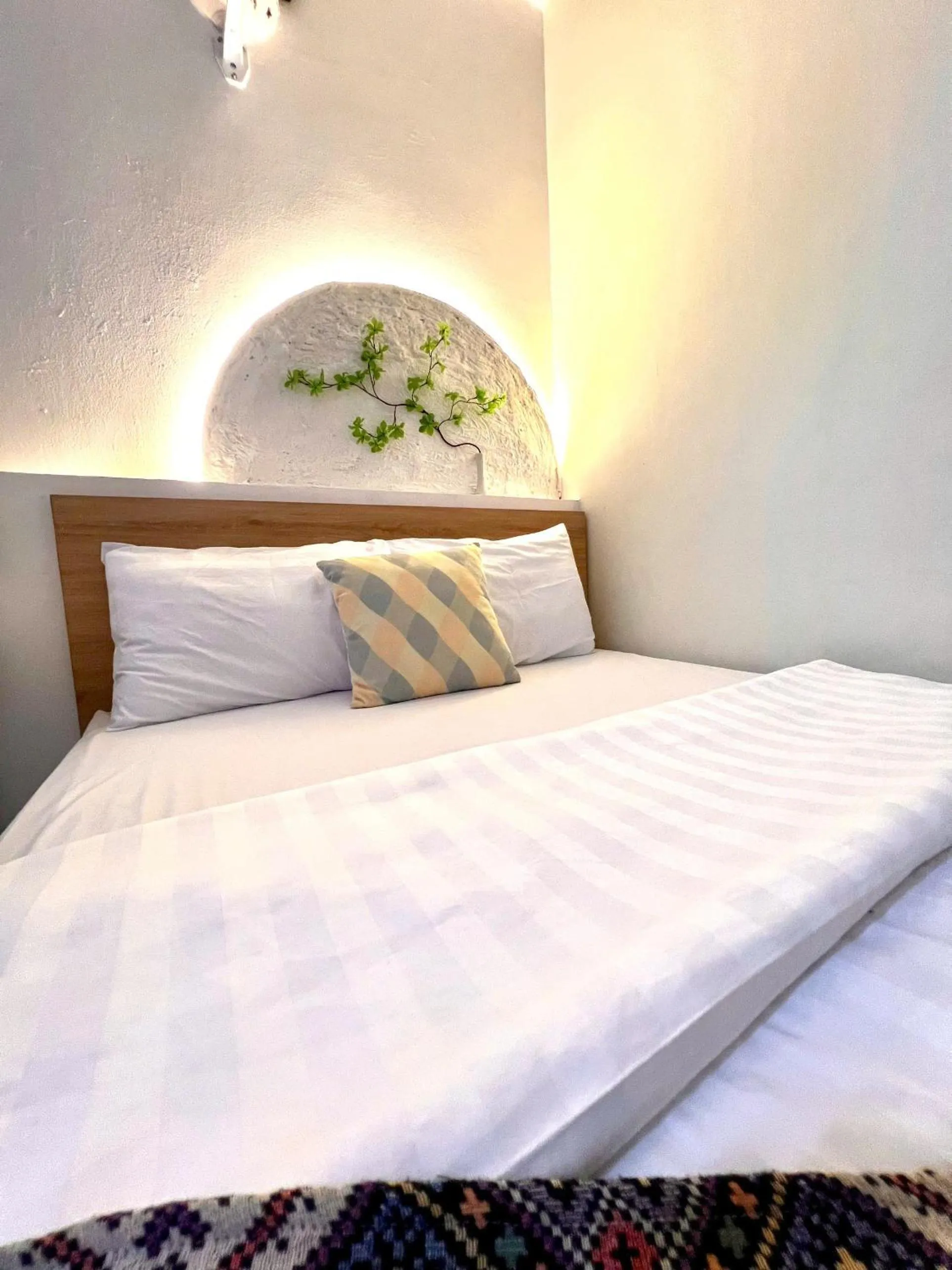 Bed in Jasmine Hotel