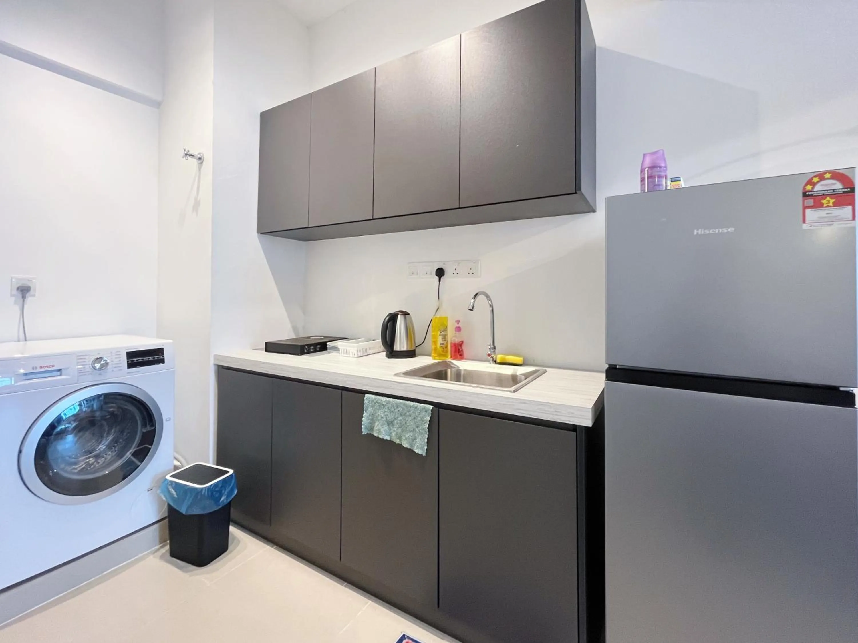 Kitchen or kitchenette in The Colony By Infinitum By Awesomestay