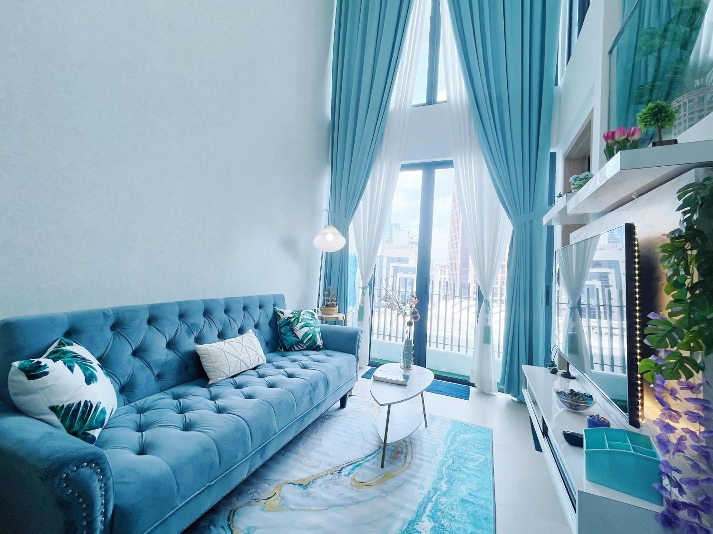 Communal lounge/ TV room in The Colony By Infinitum By Awesomestay