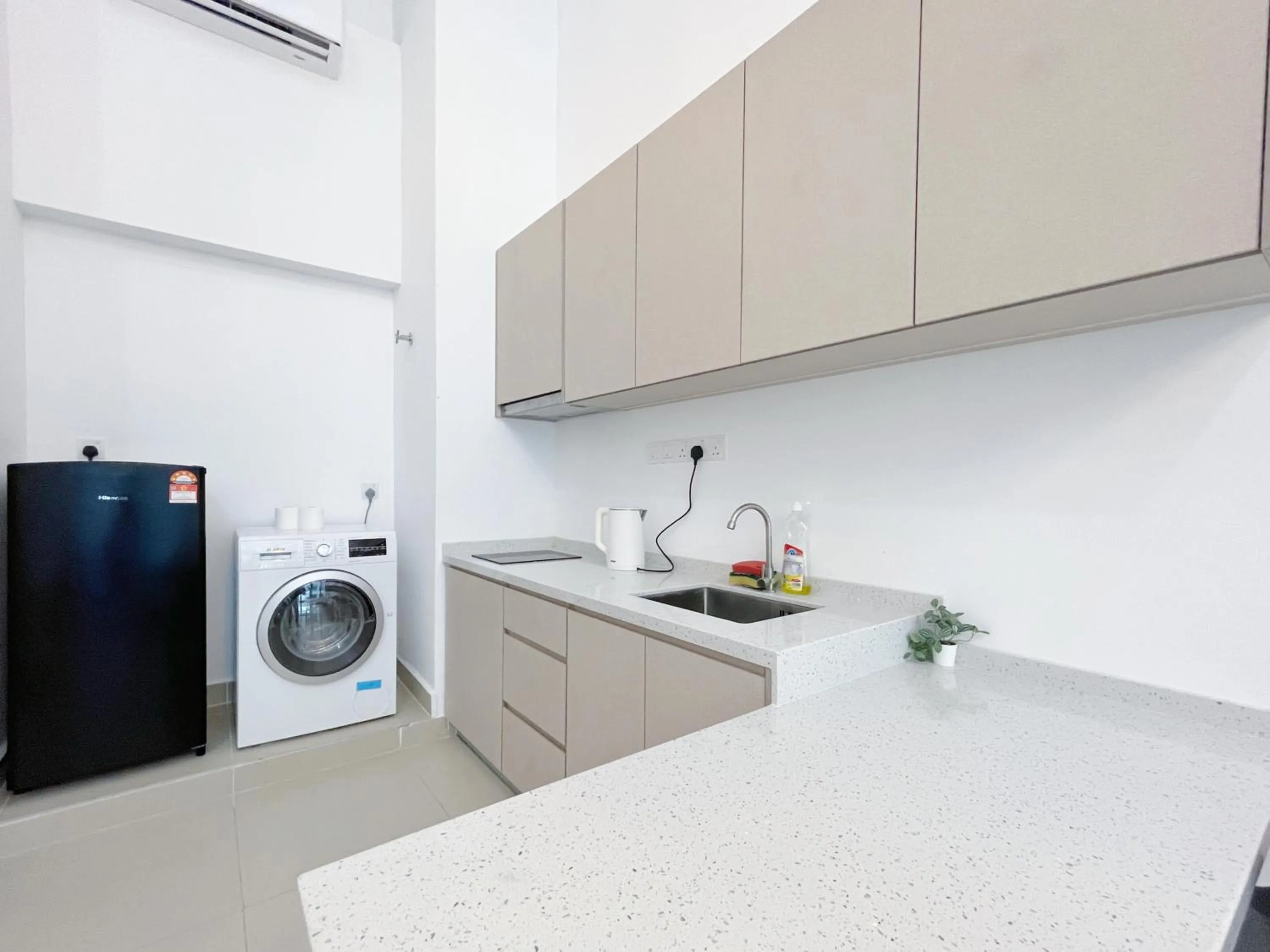 Kitchen or kitchenette in The Colony By Infinitum By Awesomestay