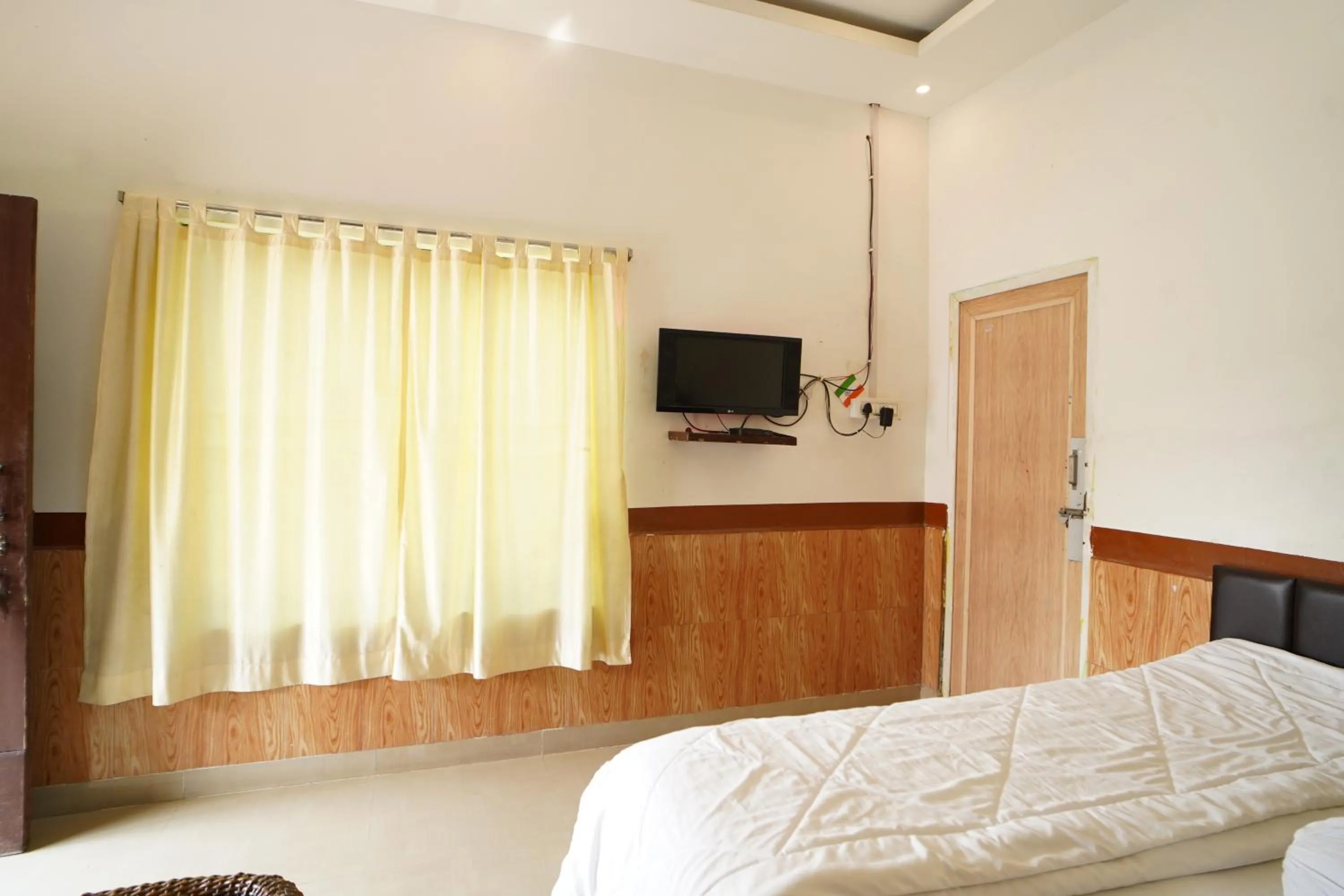 Bed in Lake View Village Resort
