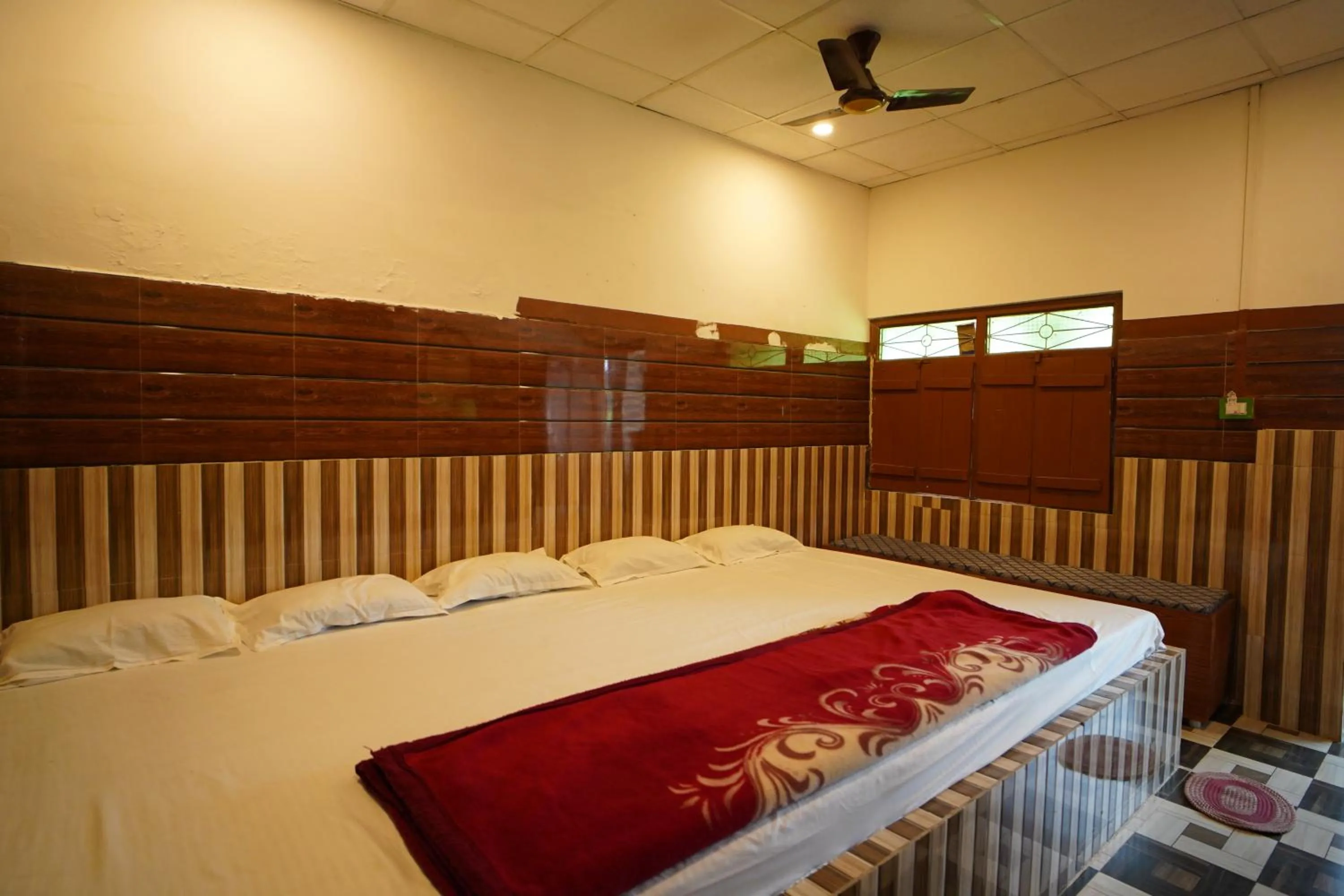 Bed in Lake View Village Resort