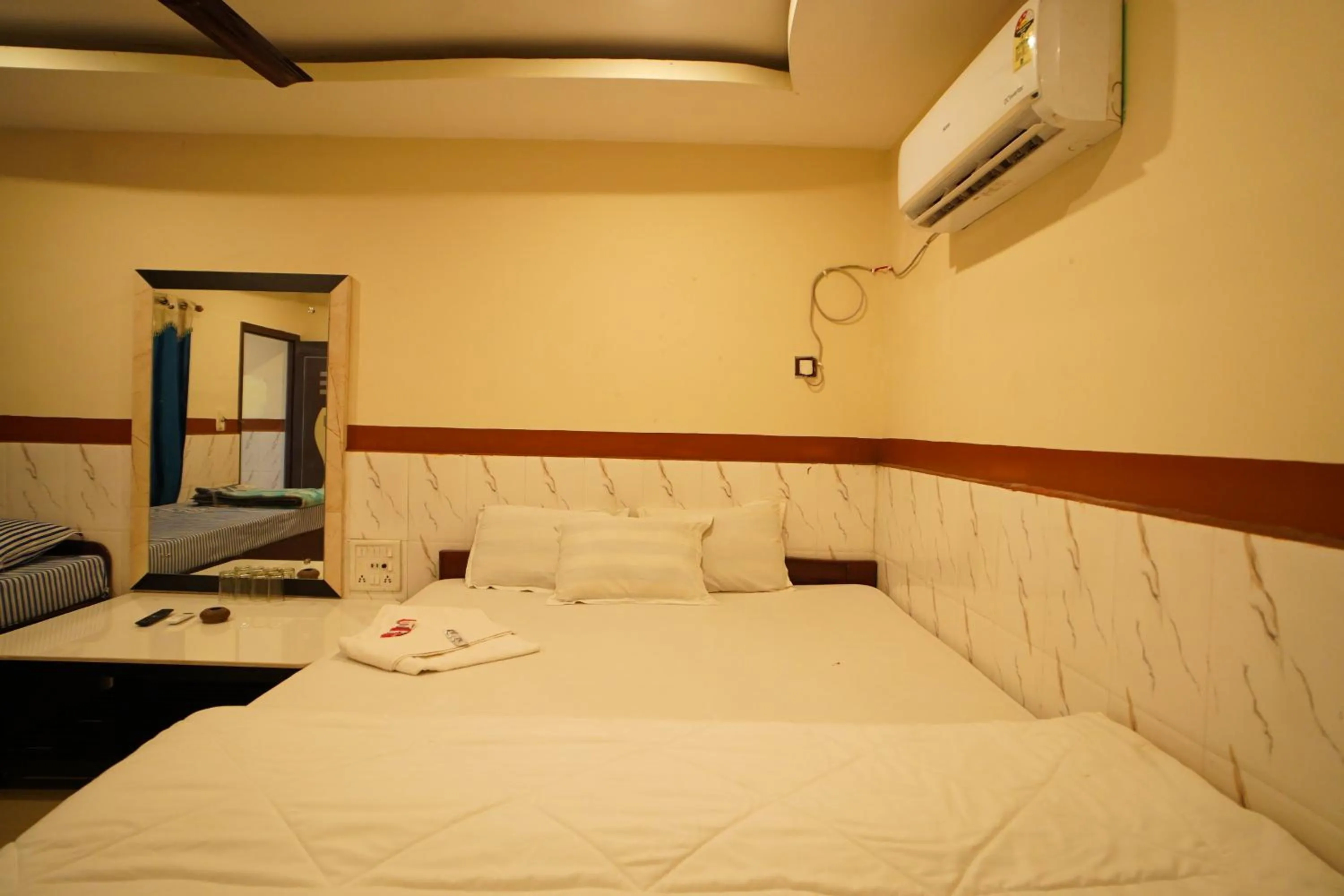 Bed in Lake View Village Resort