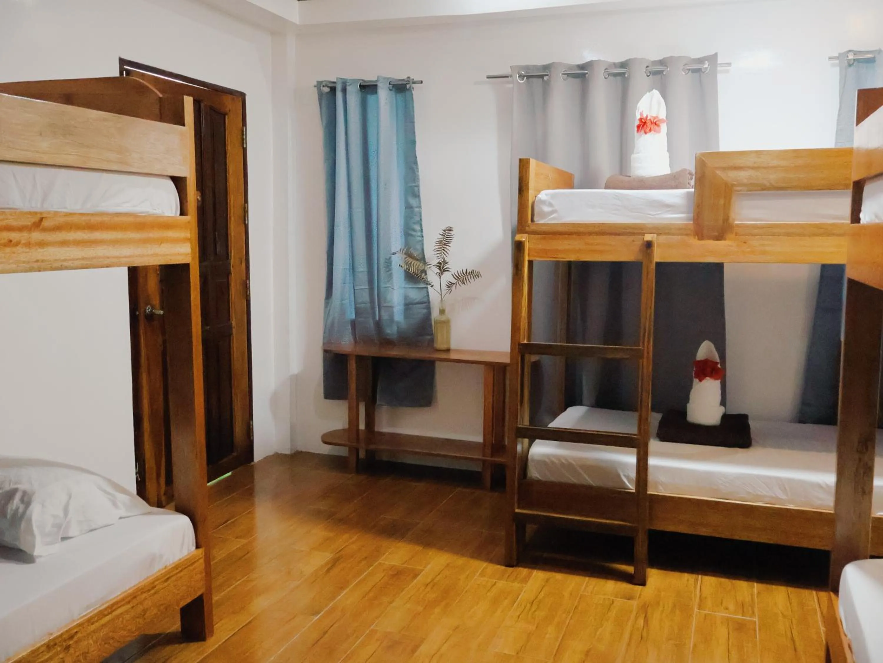 Bed in LANGOJON JIANJOY BEACH RESORT