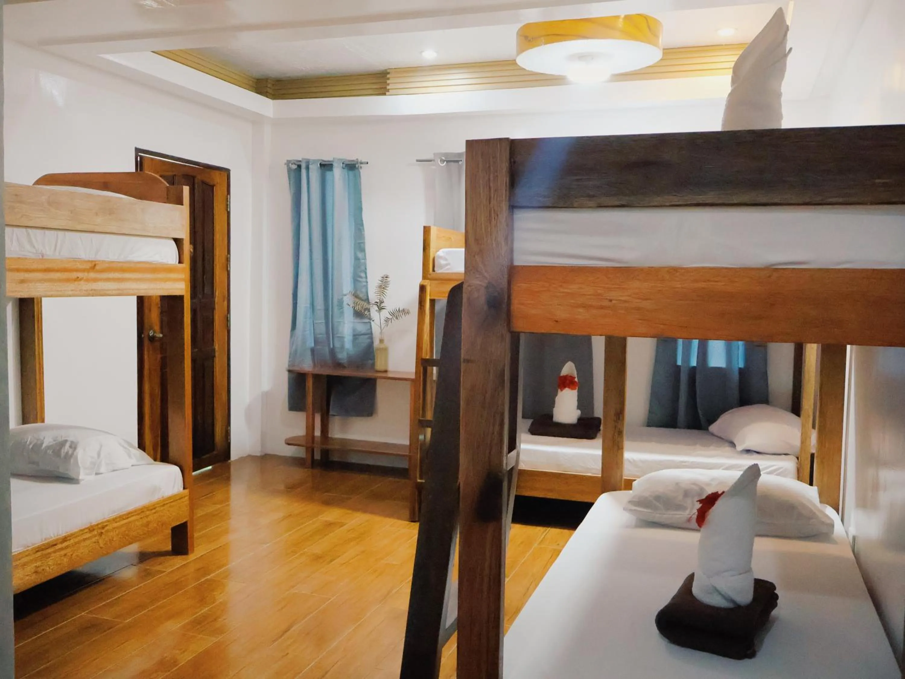 Bed in LANGOJON JIANJOY BEACH RESORT