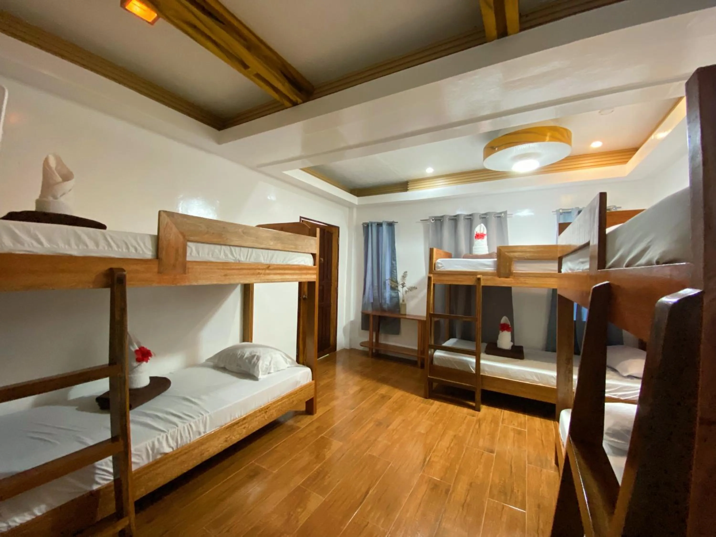 Bed in LANGOJON JIANJOY BEACH RESORT