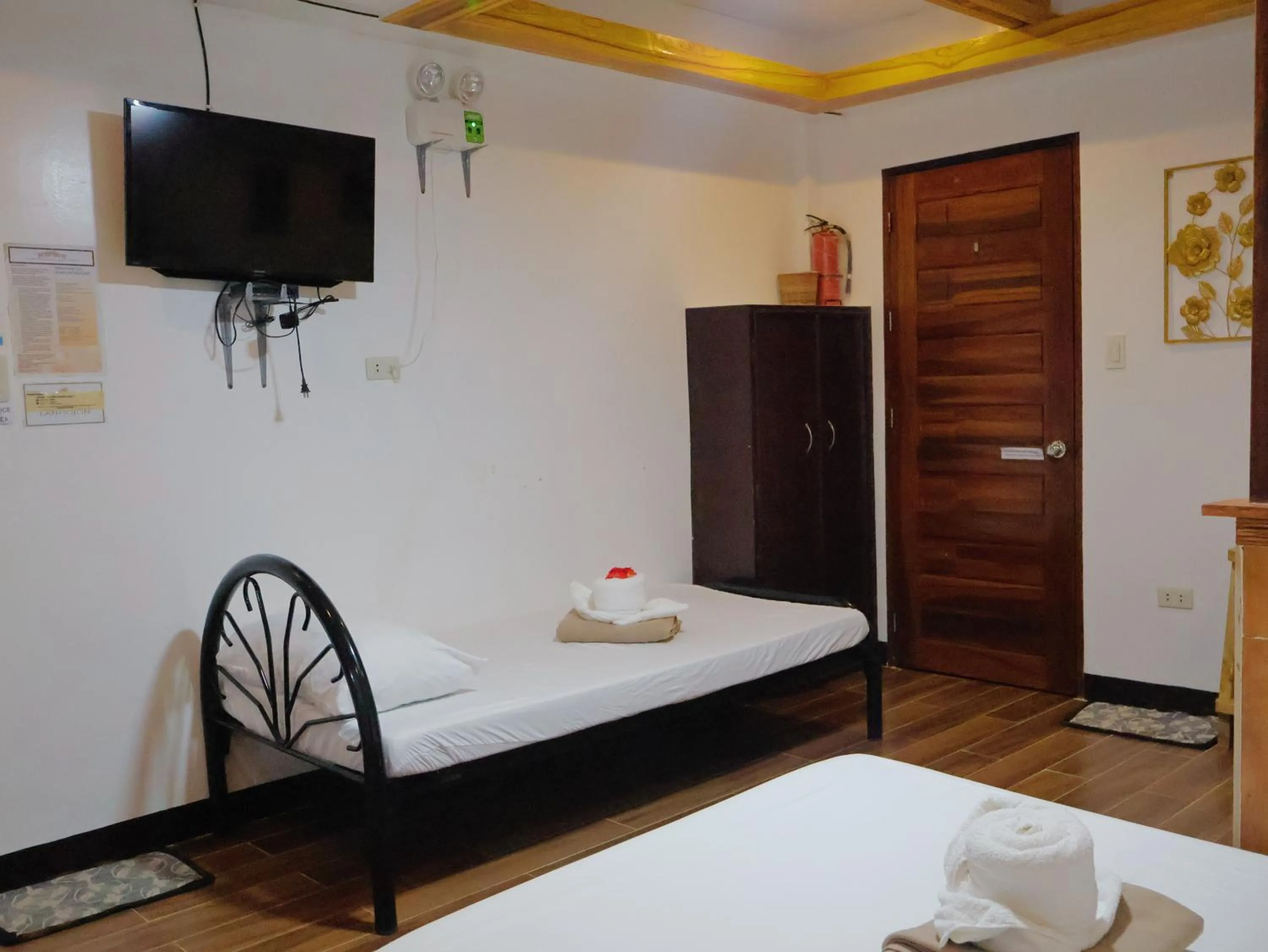 Bed in LANGOJON JIANJOY BEACH RESORT