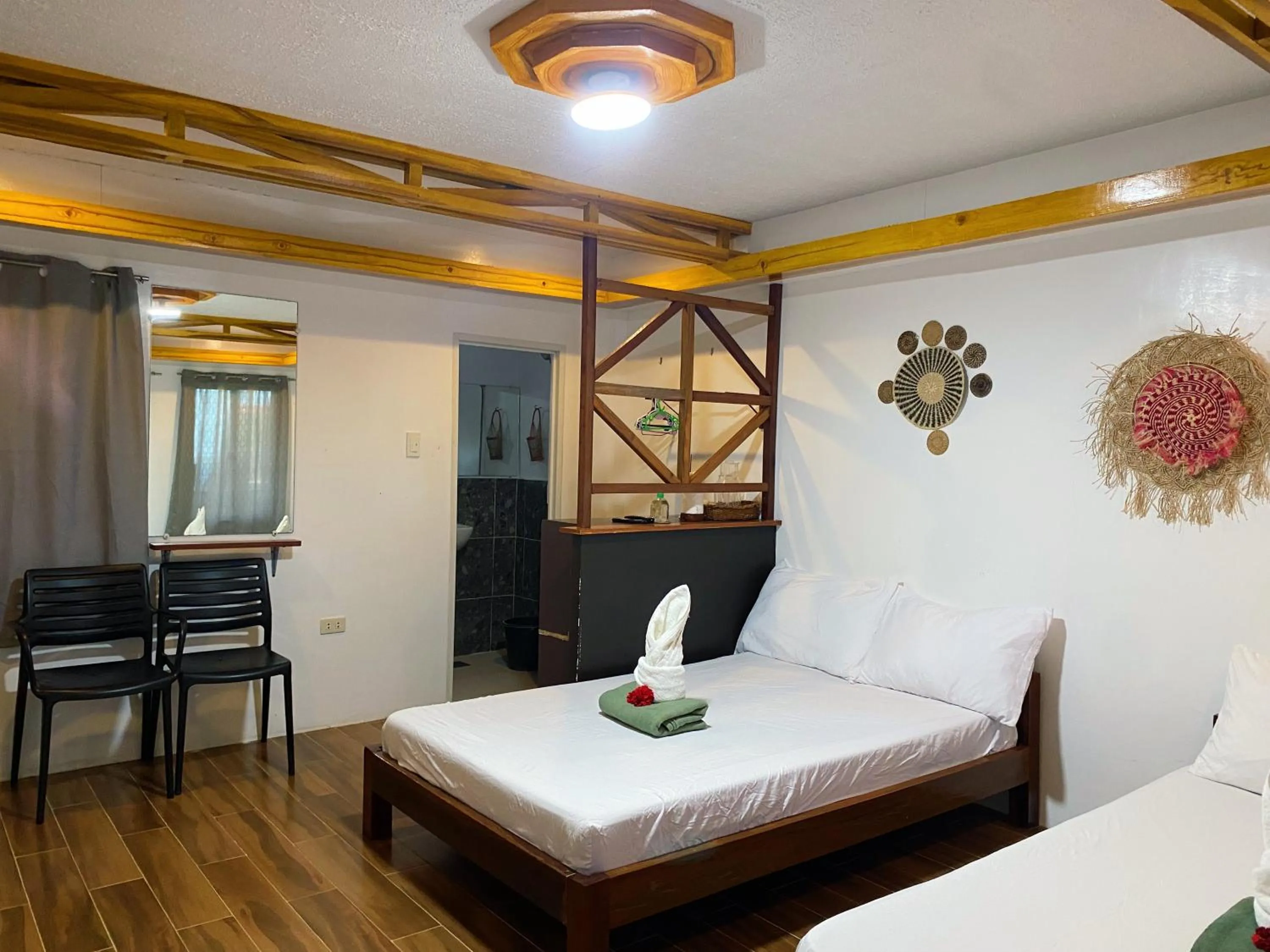 Bed in LANGOJON JIANJOY BEACH RESORT