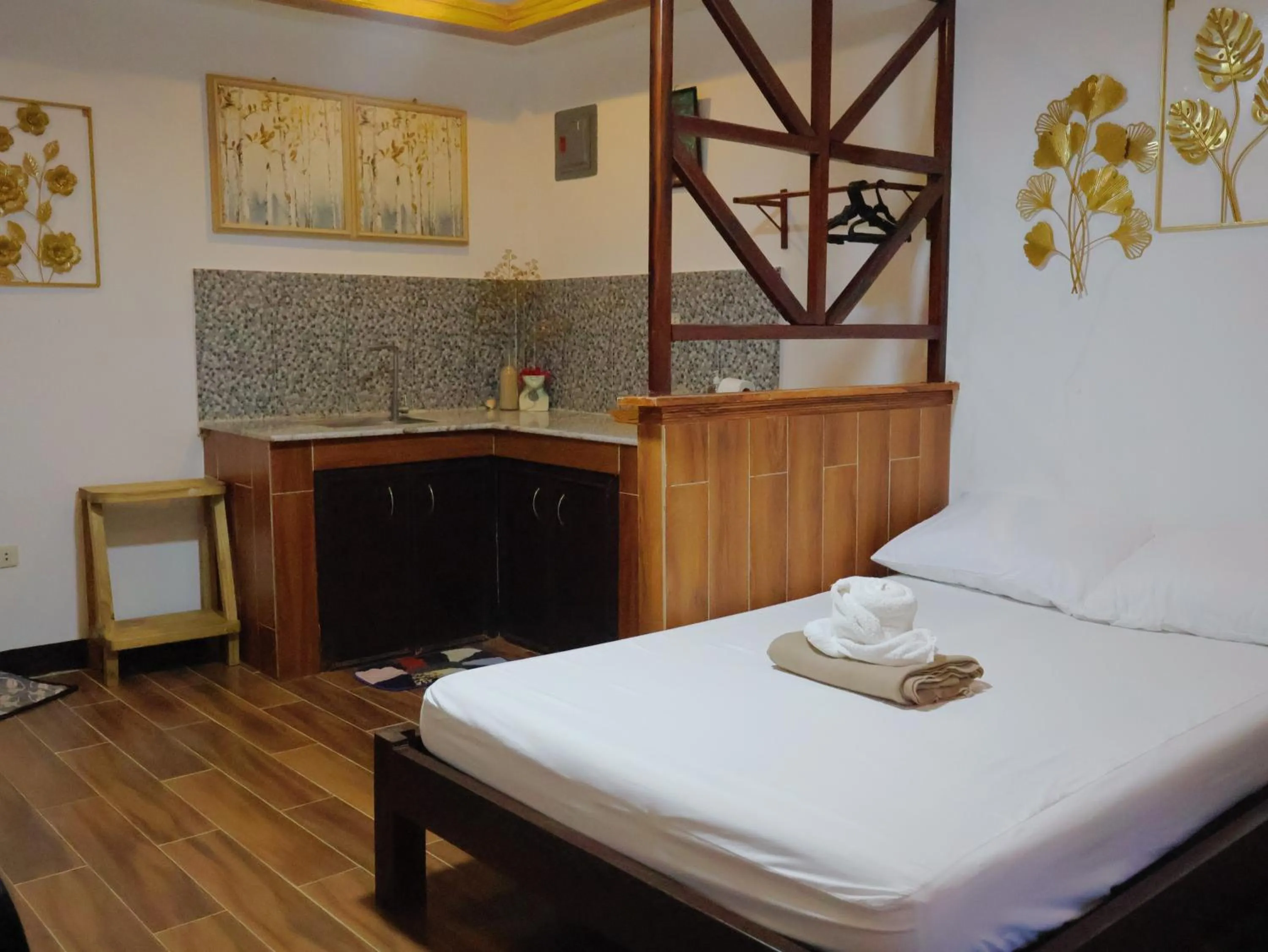 Bed in LANGOJON JIANJOY BEACH RESORT