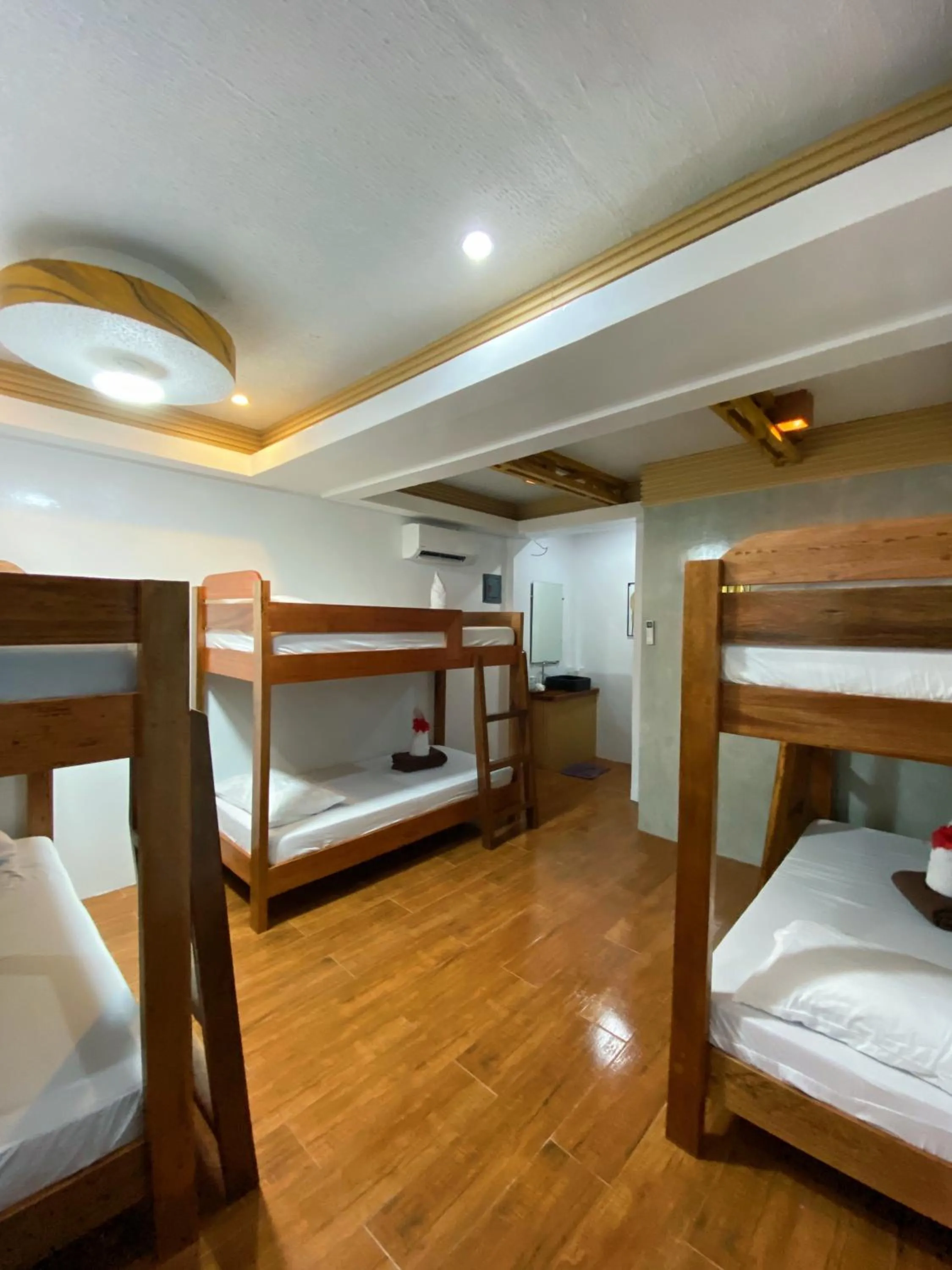 Bed in LANGOJON JIANJOY BEACH RESORT