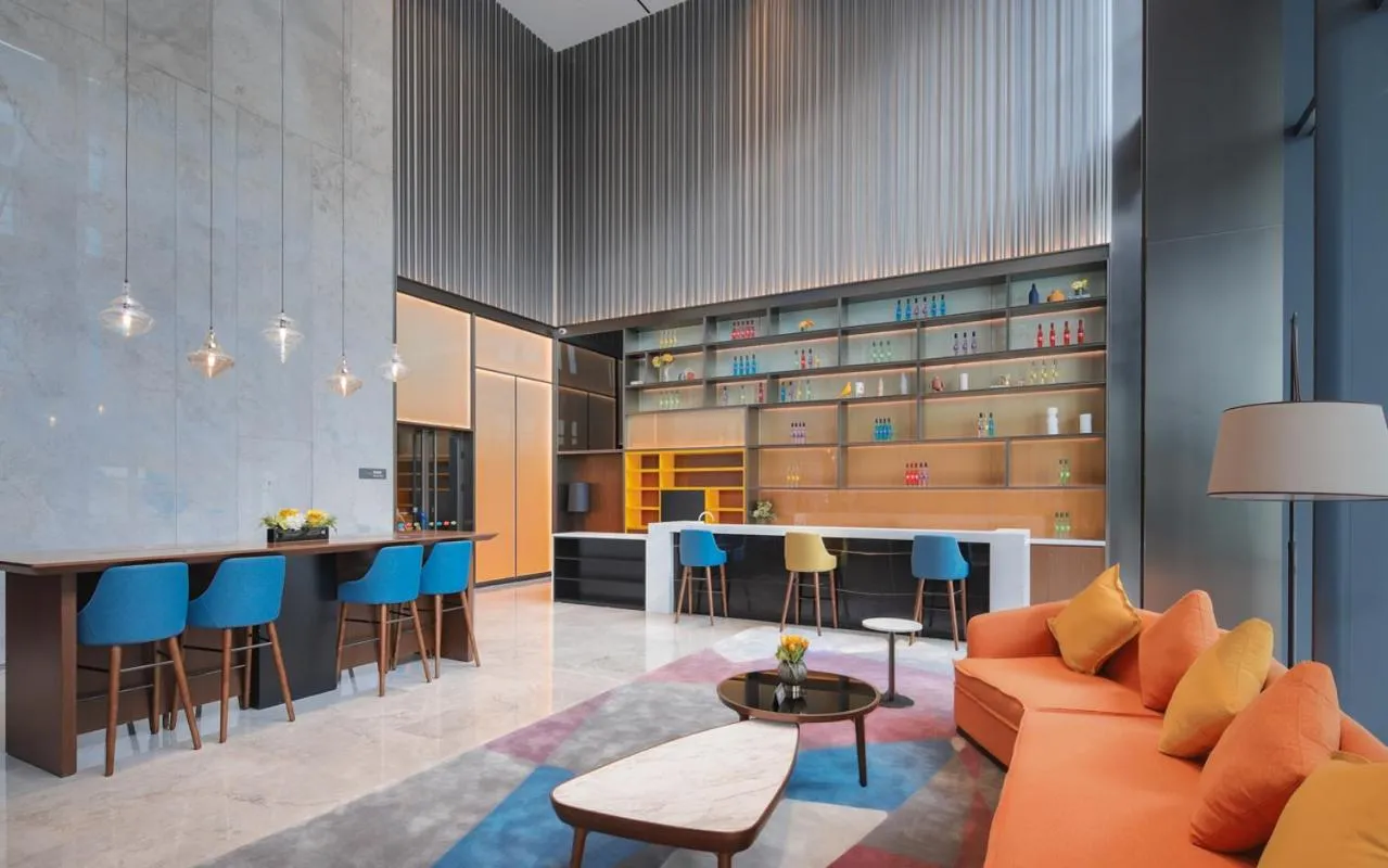 Communal lounge/ TV room in Hampton by Hilton Shenzhen Yuanshan