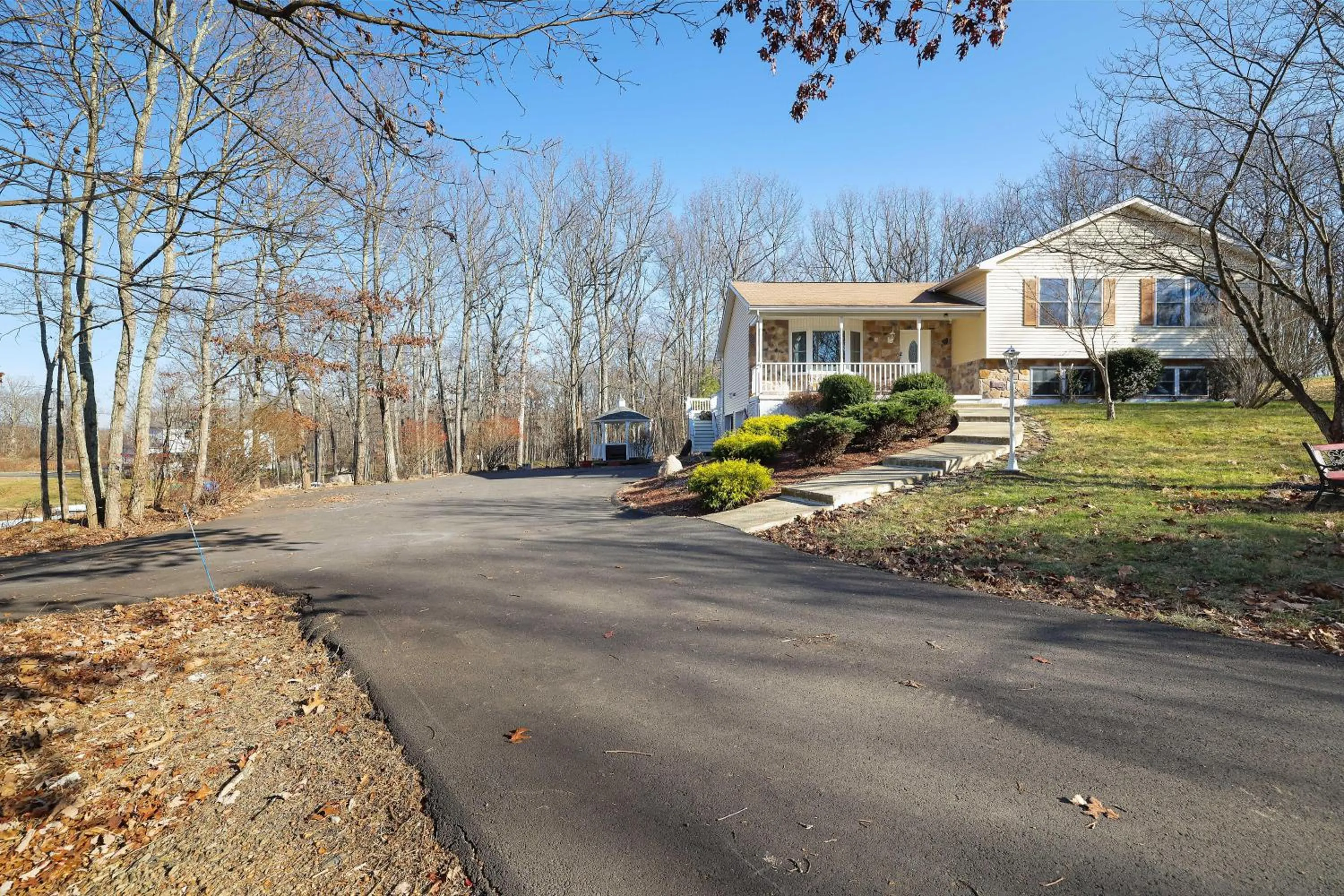 Property building in Stunning Poconos Villa- Hot Tub, Pool, Game Room, BBQ & more