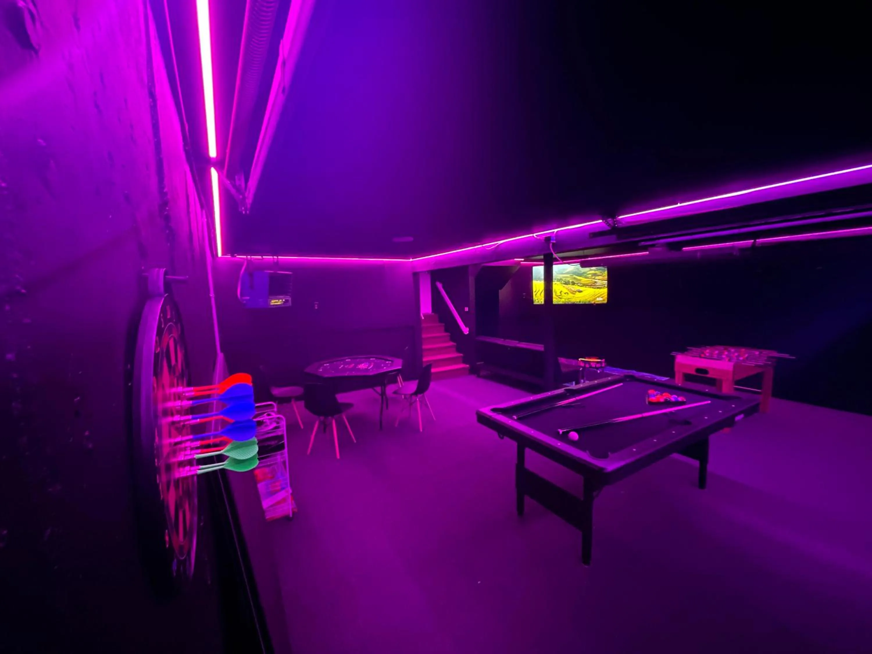 Communal lounge/ TV room in Stunning Poconos Villa- Hot Tub, Pool, Game Room, BBQ & more