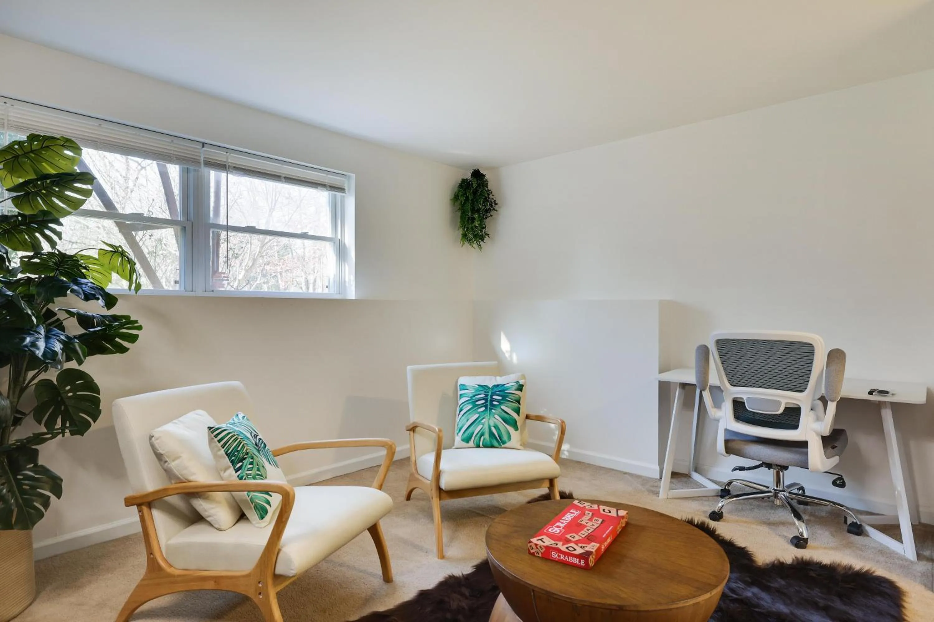 Seating area in Stunning Poconos Villa- Hot Tub, Pool, Game Room, BBQ & more