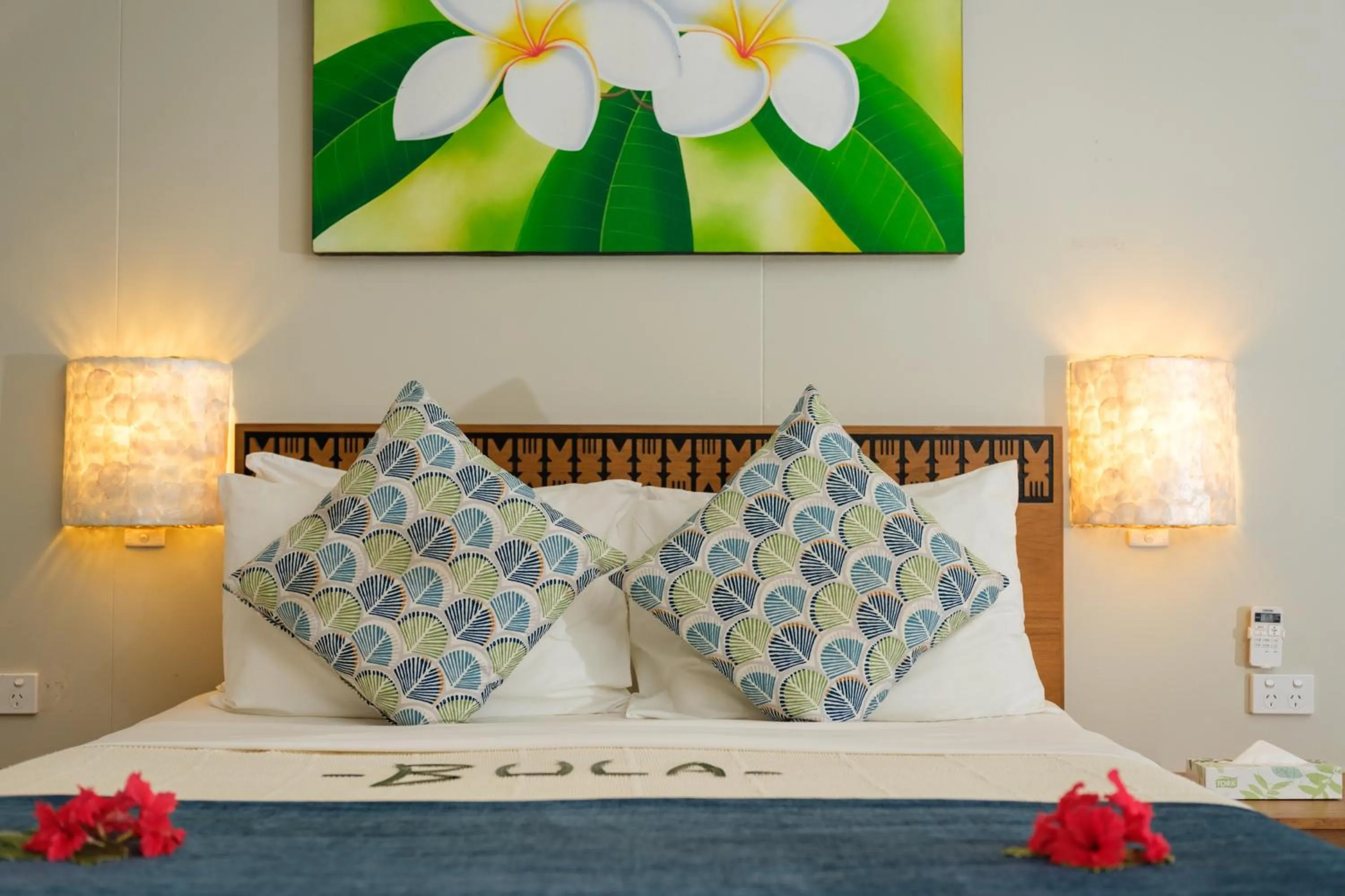 Bed in Plantation Island Resort