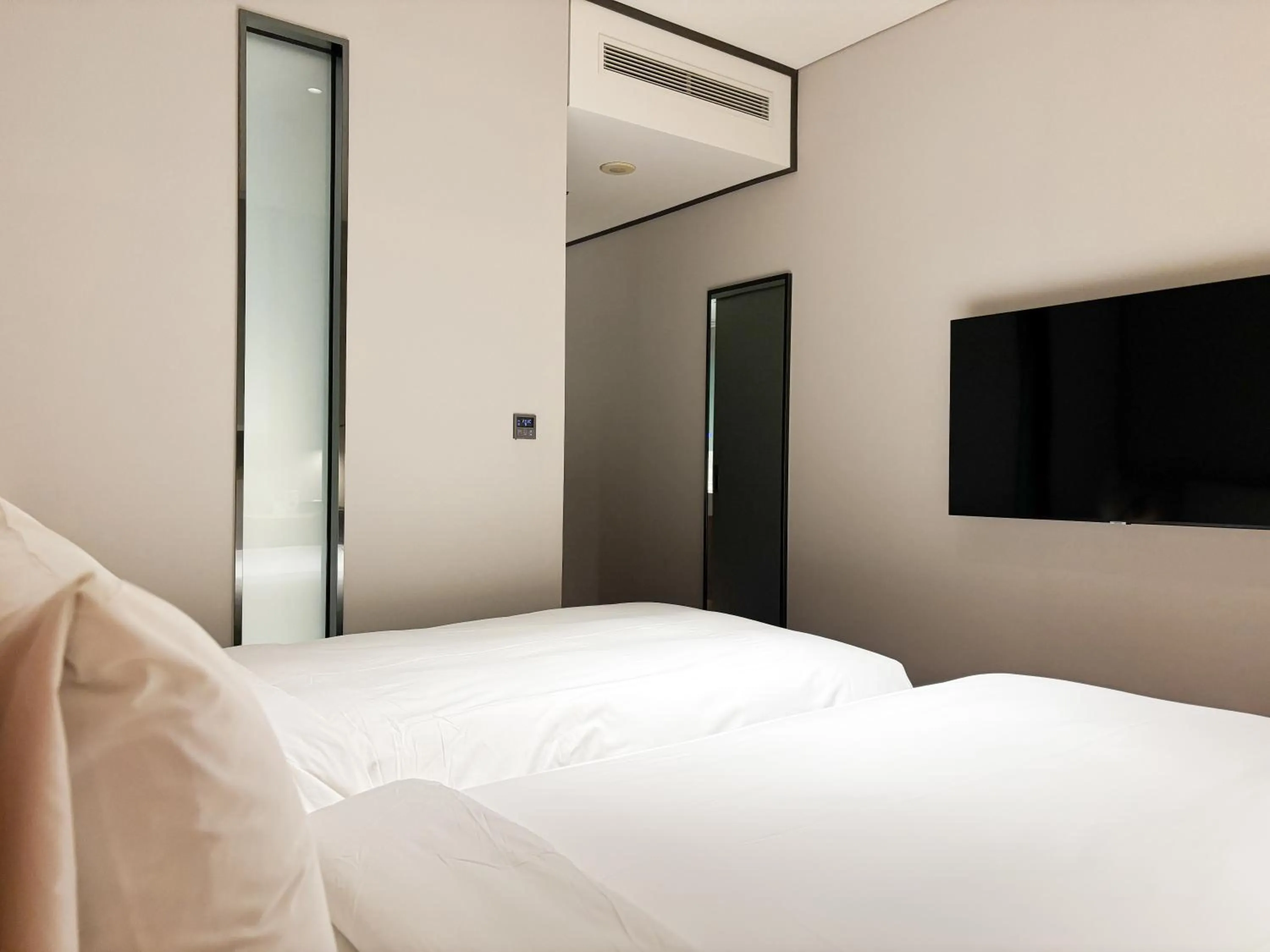 Bed in Ibis Ambassador Suwon