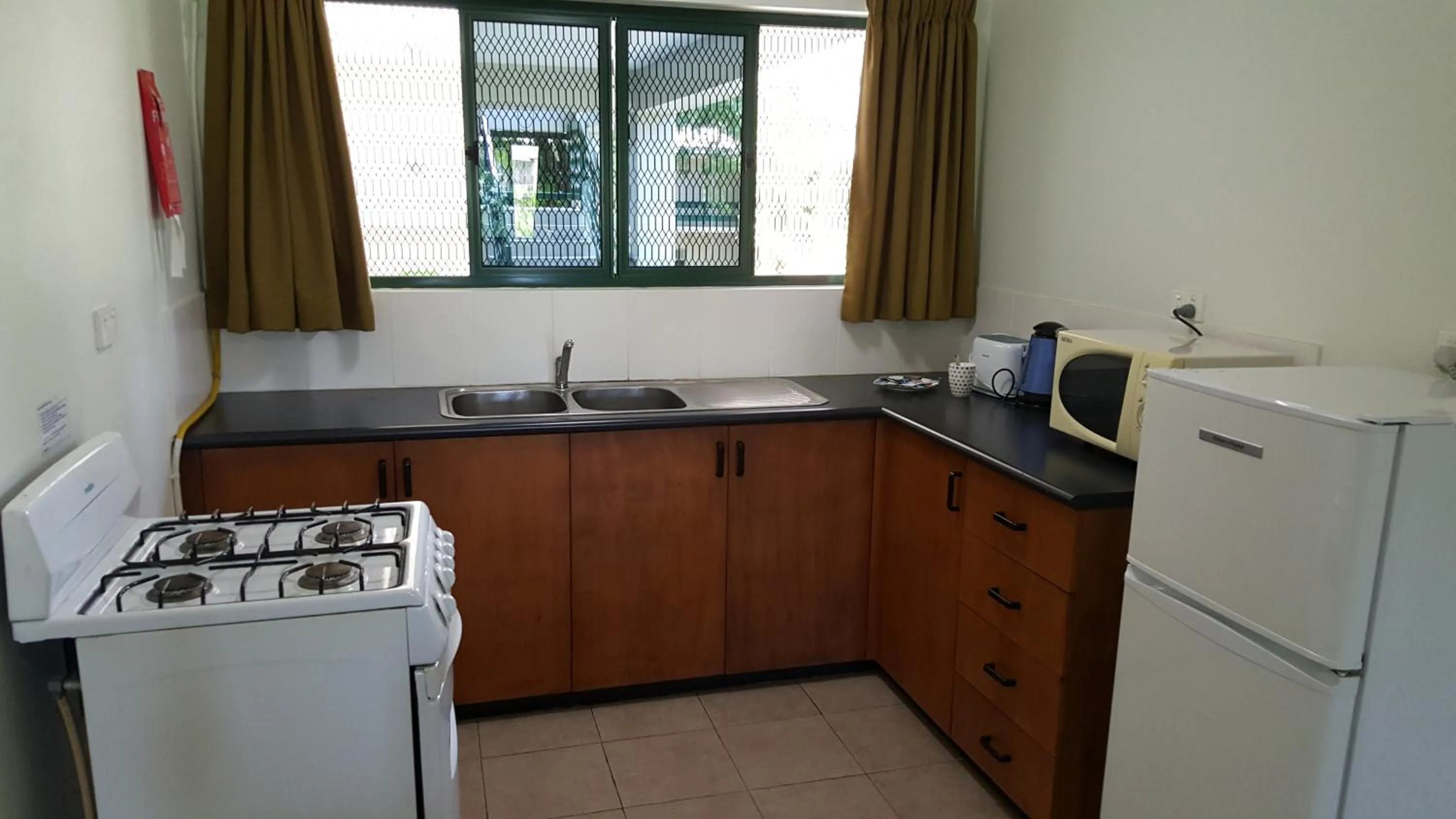 Kitchen or kitchenette in Hexagon International Hotel, Villas & Spa