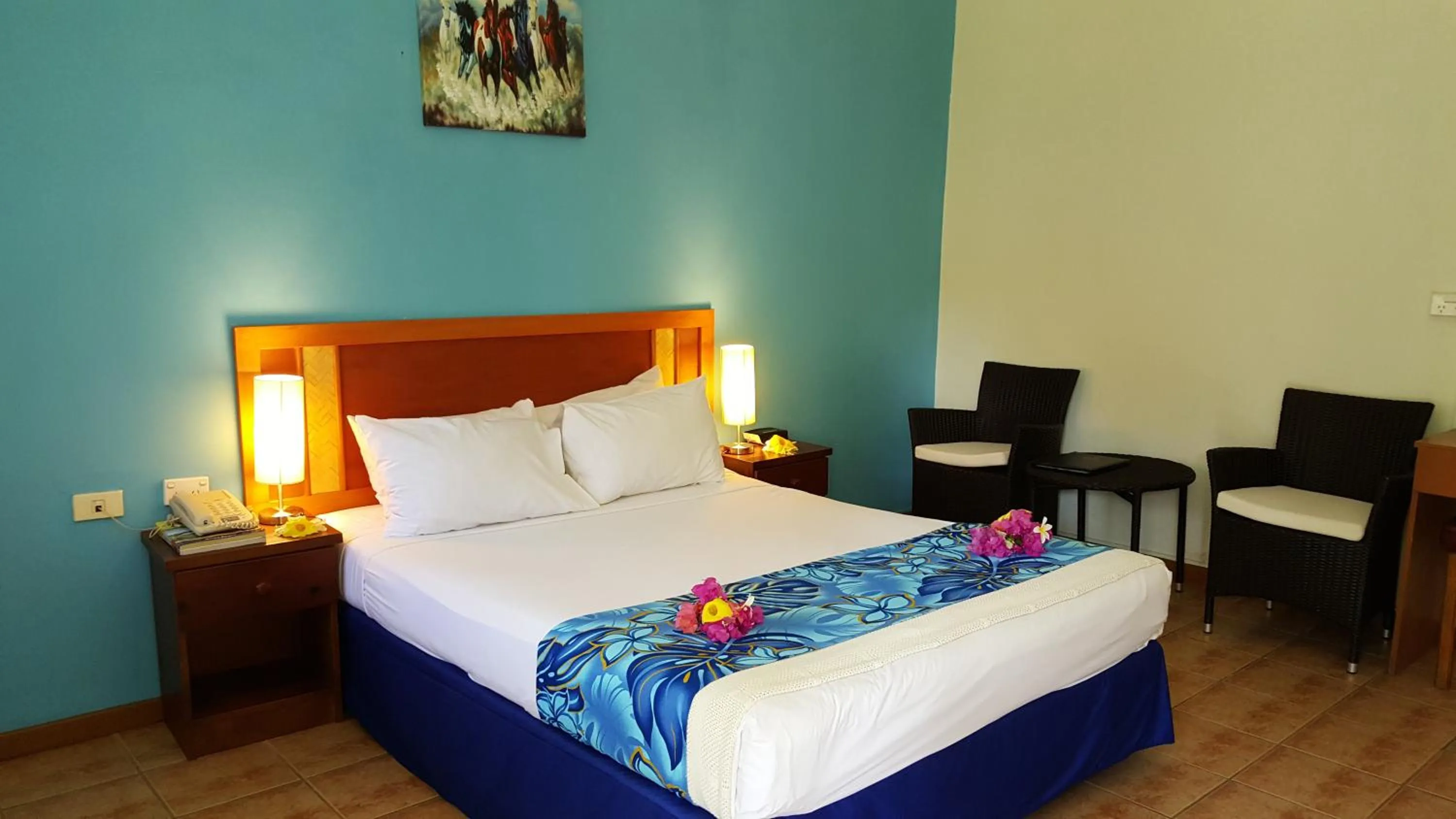 Bed in Hexagon International Hotel, Villas & Spa