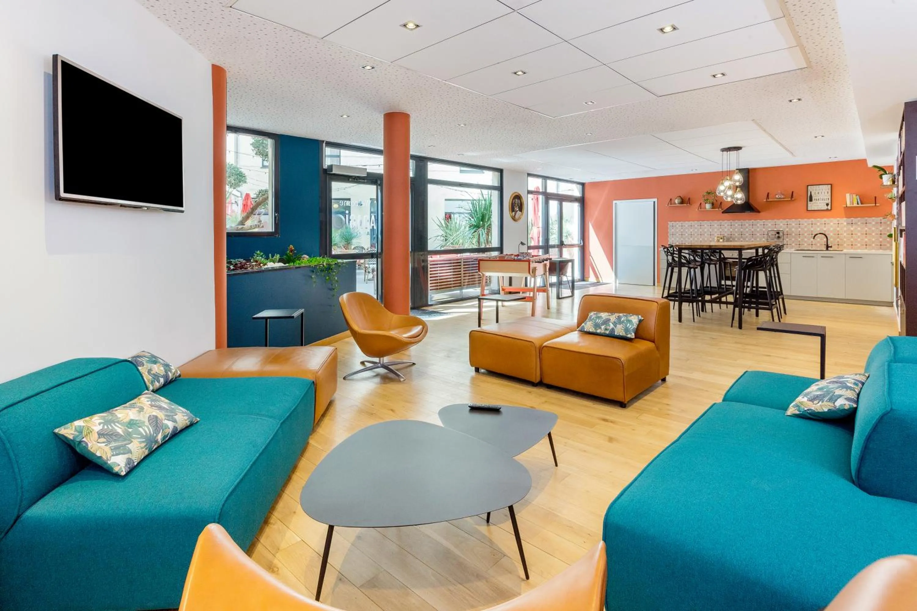 Communal lounge/ TV room in Aparthotel Adagio Montpellier Centre Comedie