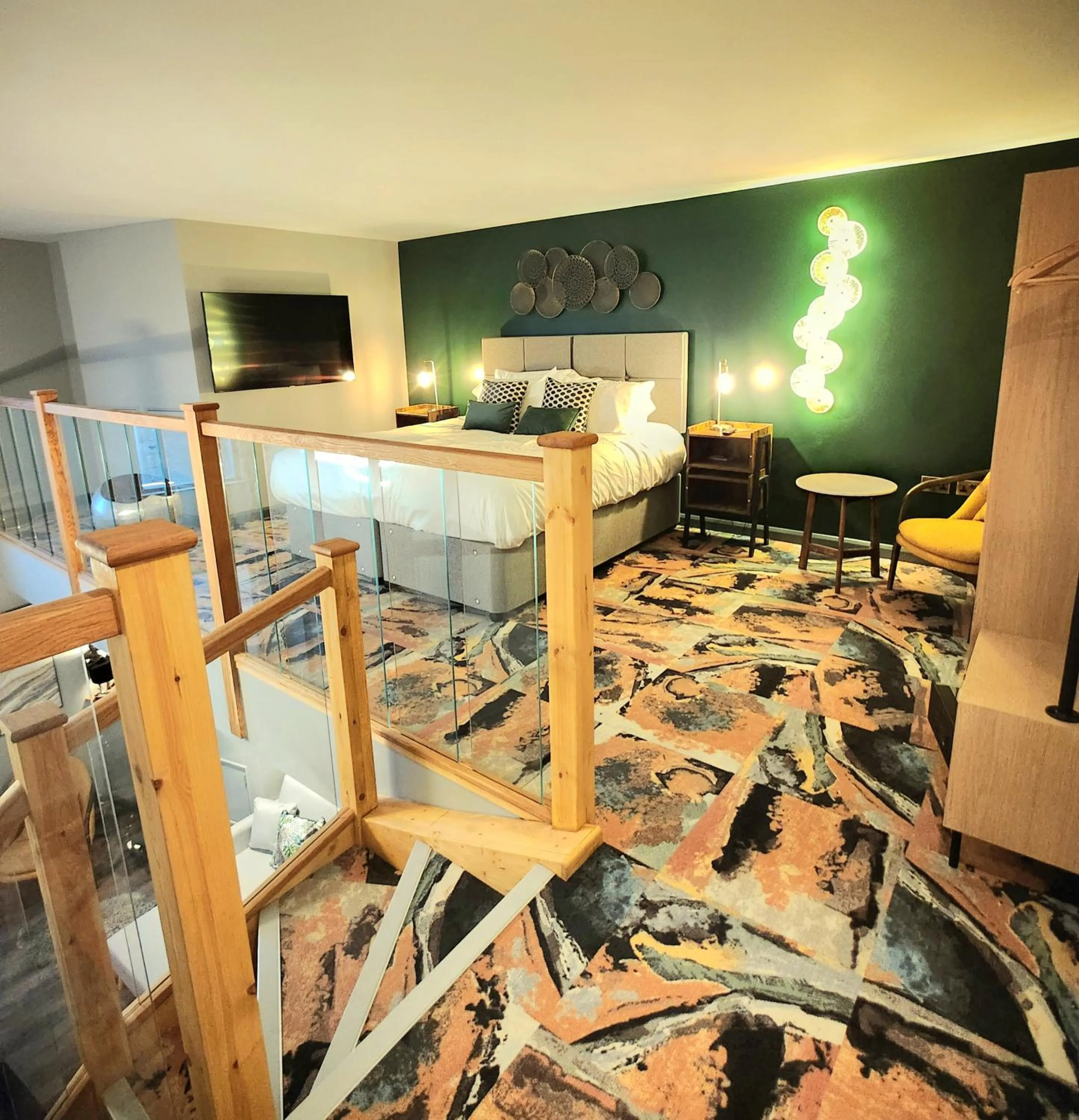 Bed in Pinnacle Suites Hotel