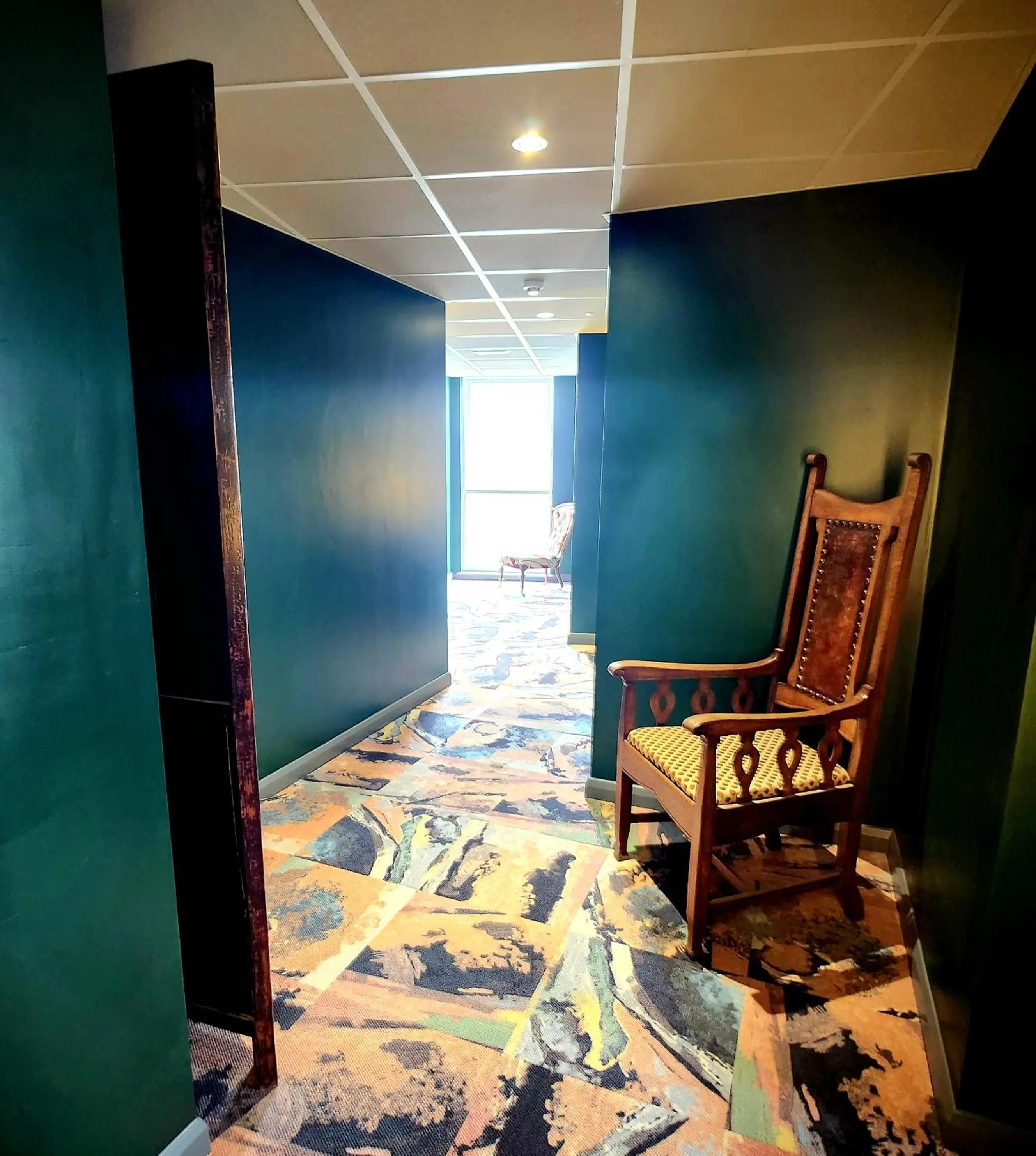 Seating area in Pinnacle Suites Hotel