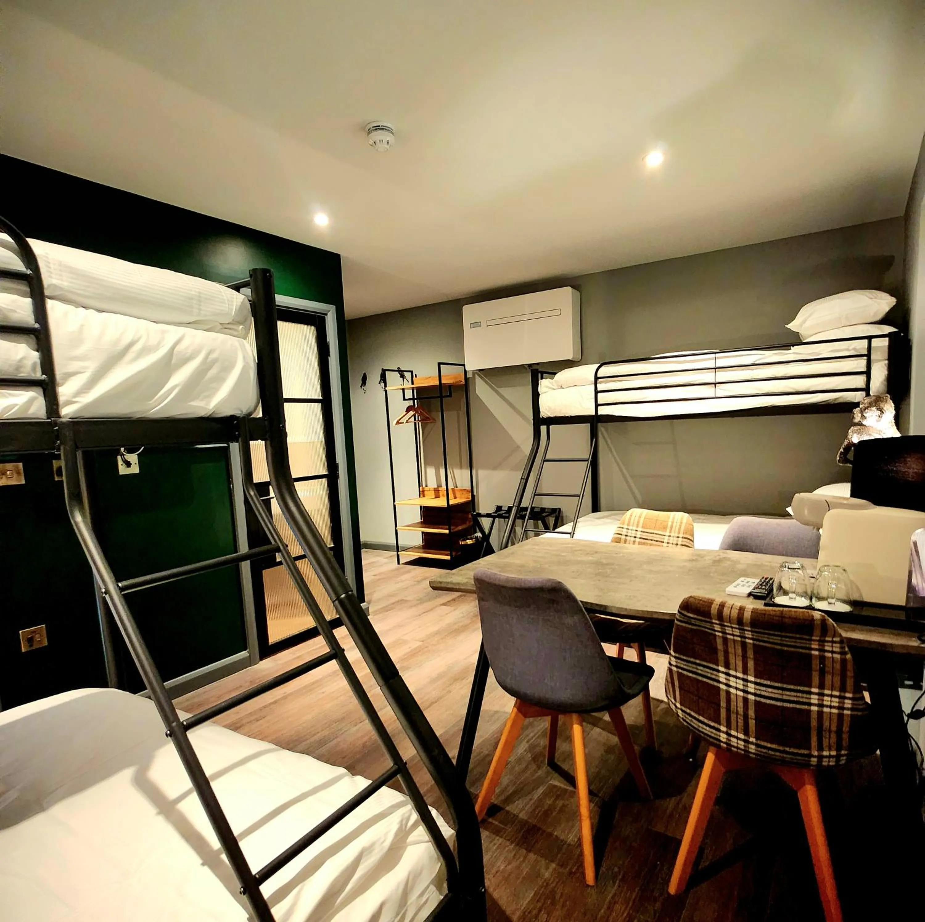 Bed in Pinnacle Suites Hotel