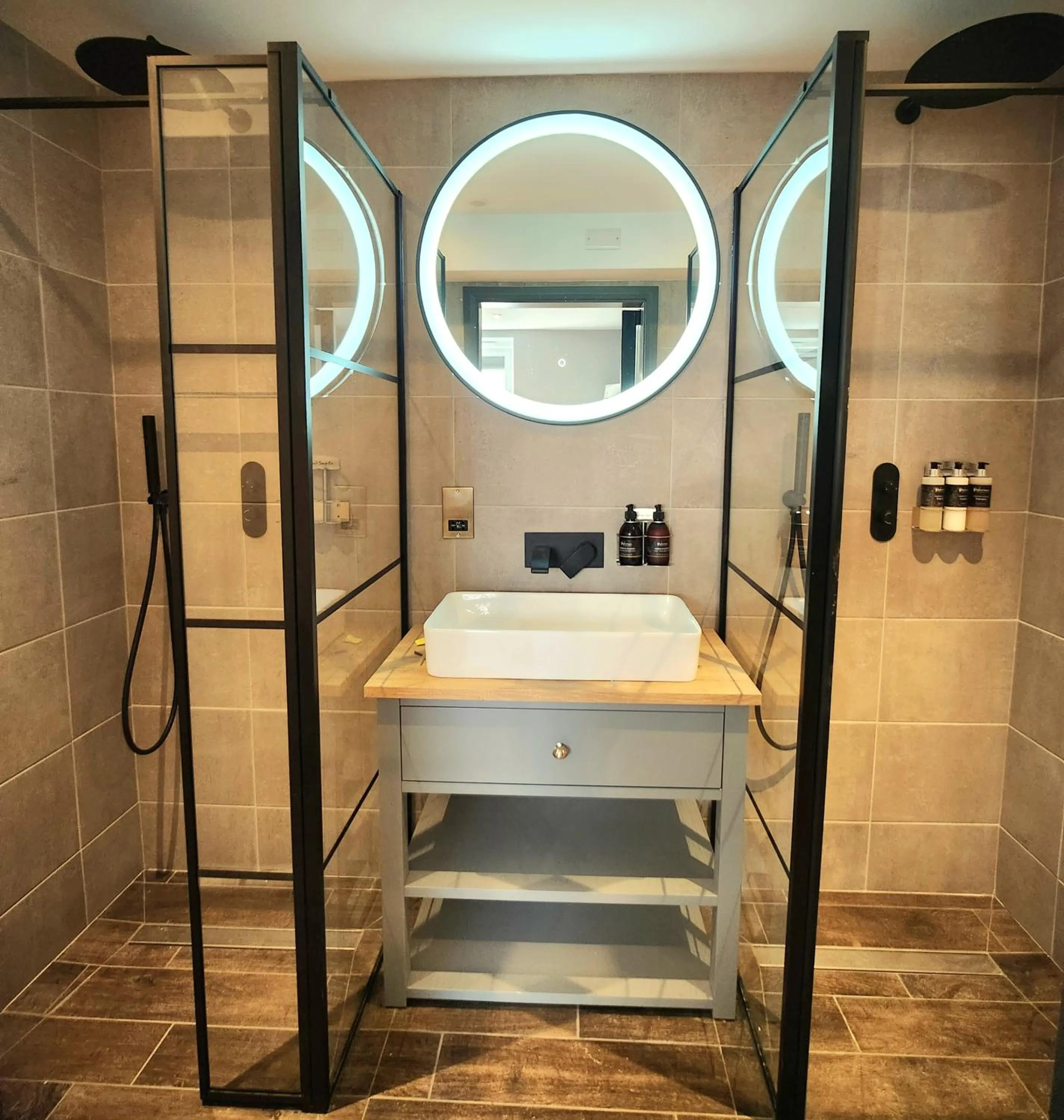 Shower in Pinnacle Suites Hotel