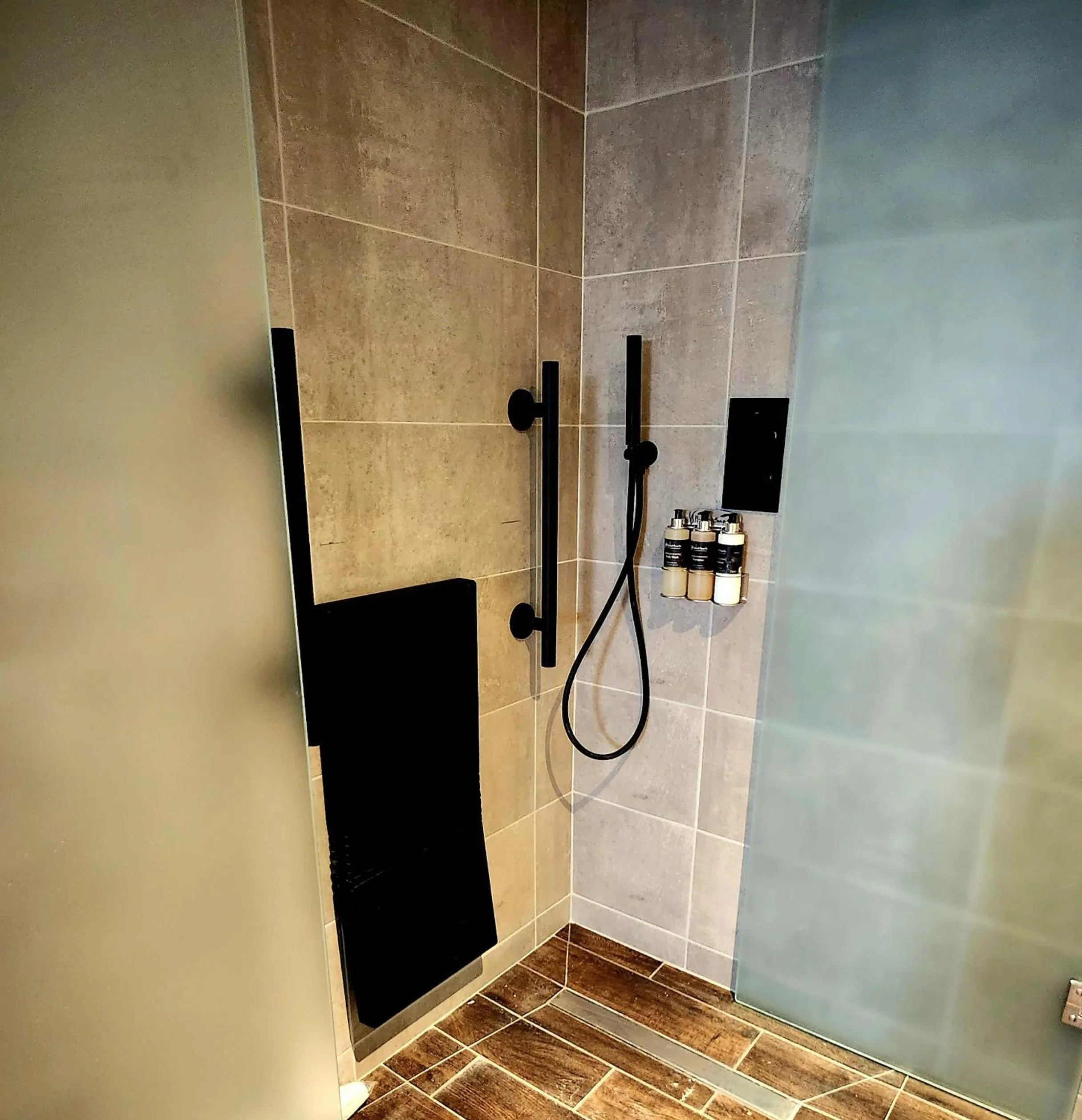 Shower in Pinnacle Suites Hotel