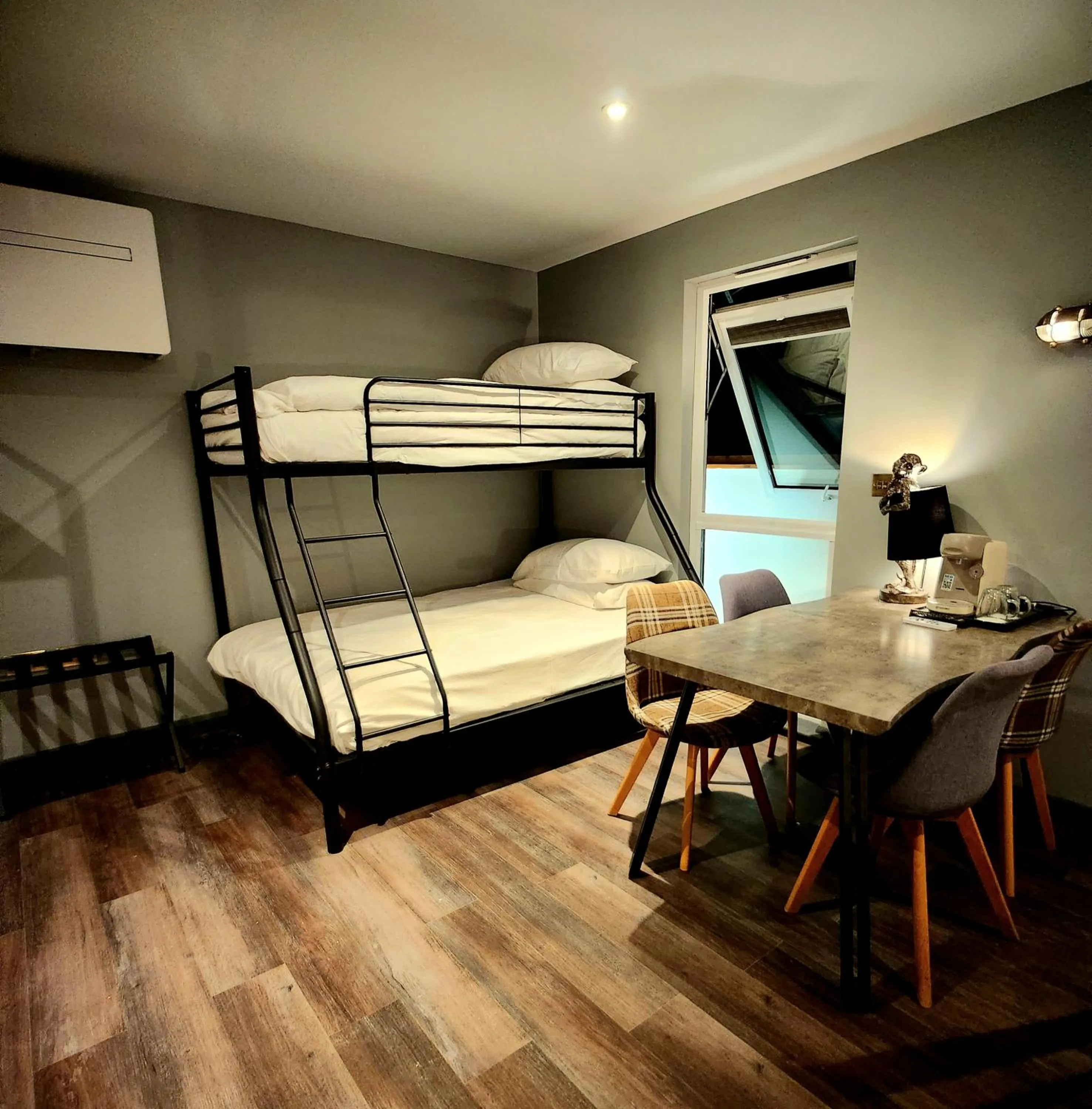 Bed in Pinnacle Suites Hotel