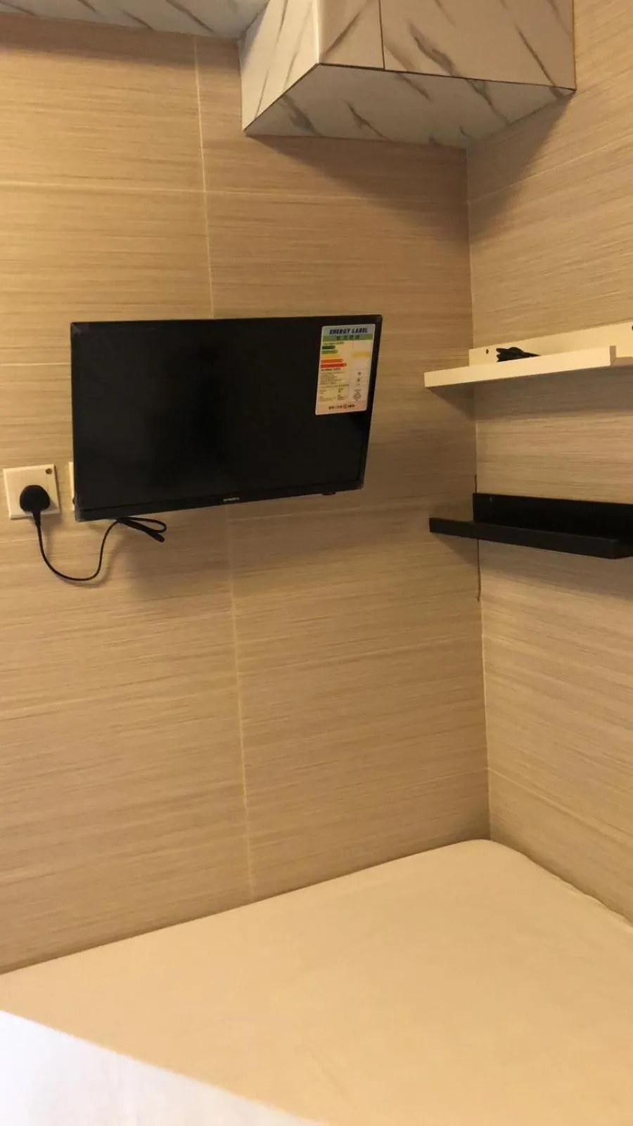 Bed in 富都賓館 Fu Dou Guest House