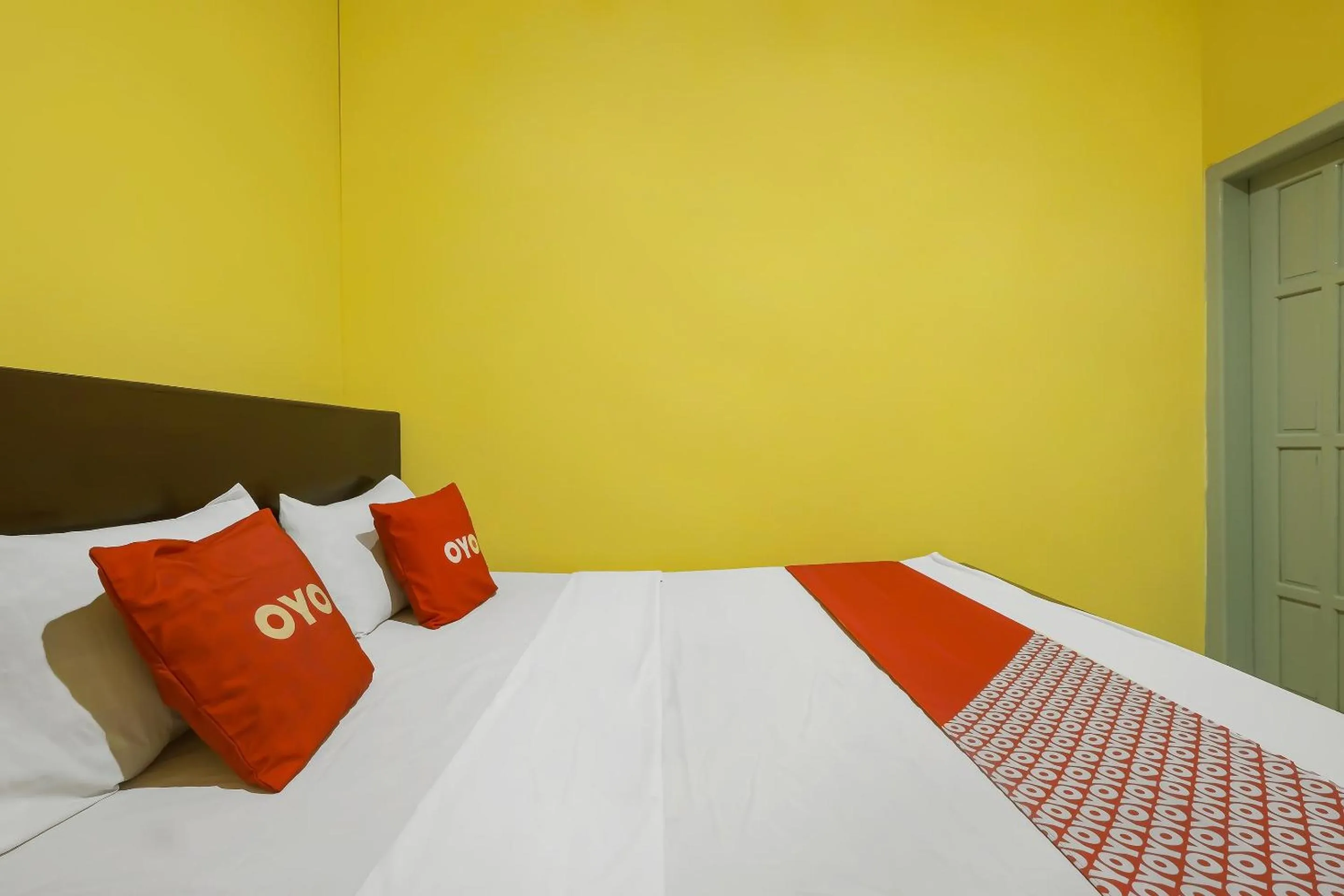 Bedroom in OYO 92483 Hotel Kirana