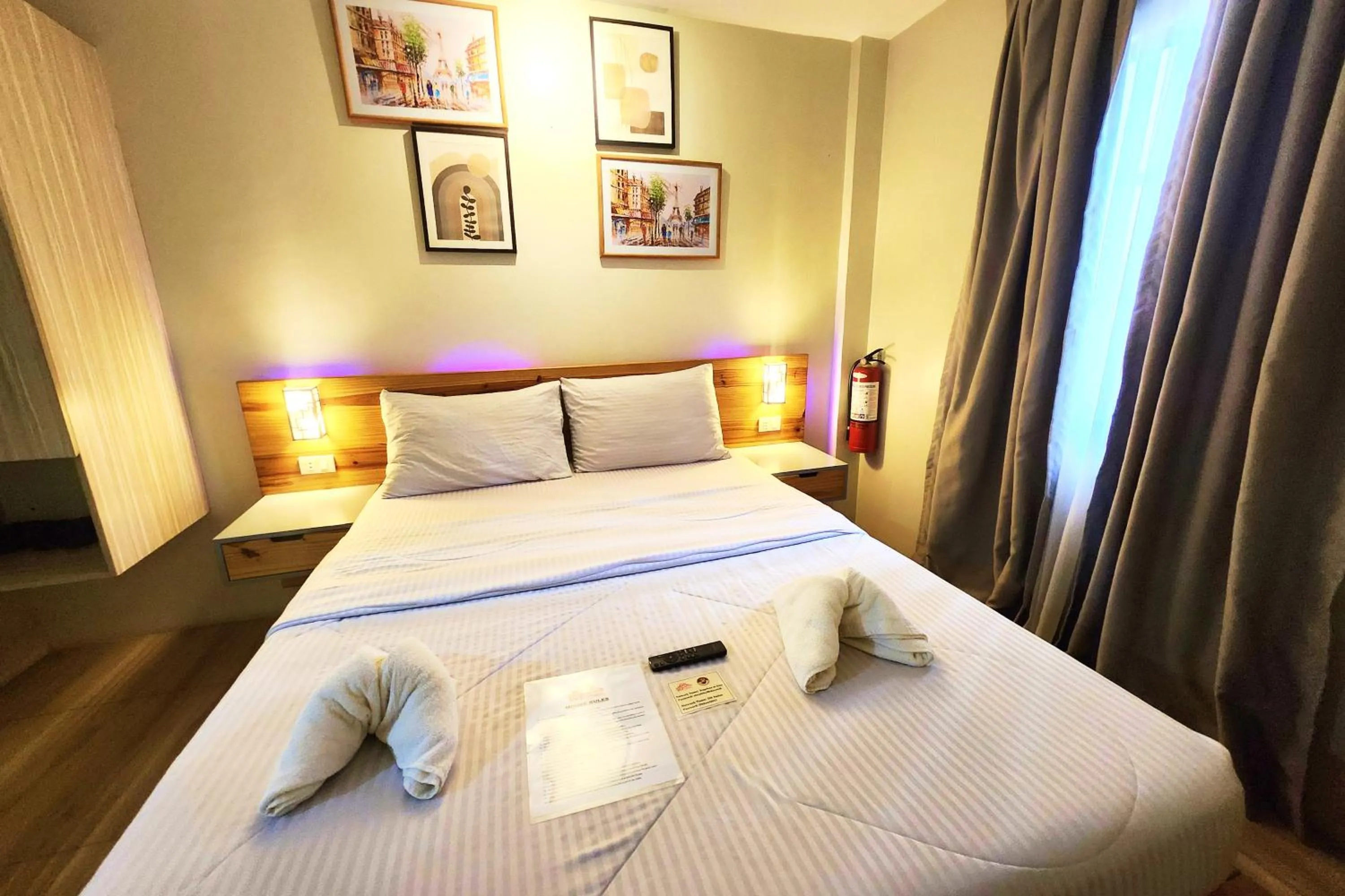 Bed in DLT Suites Cebu powered by Cocotel