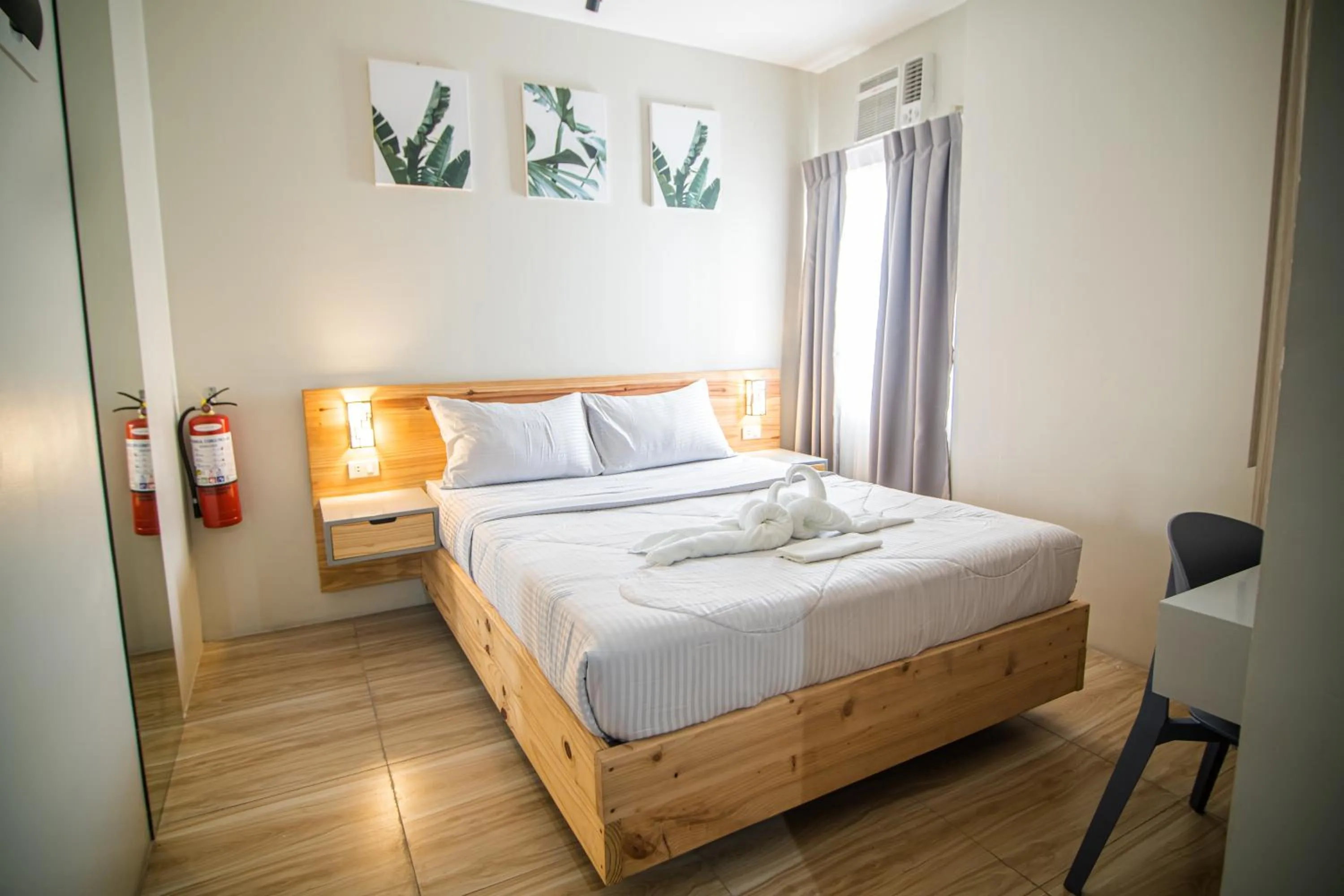 Bed in DLT Suites Cebu powered by Cocotel