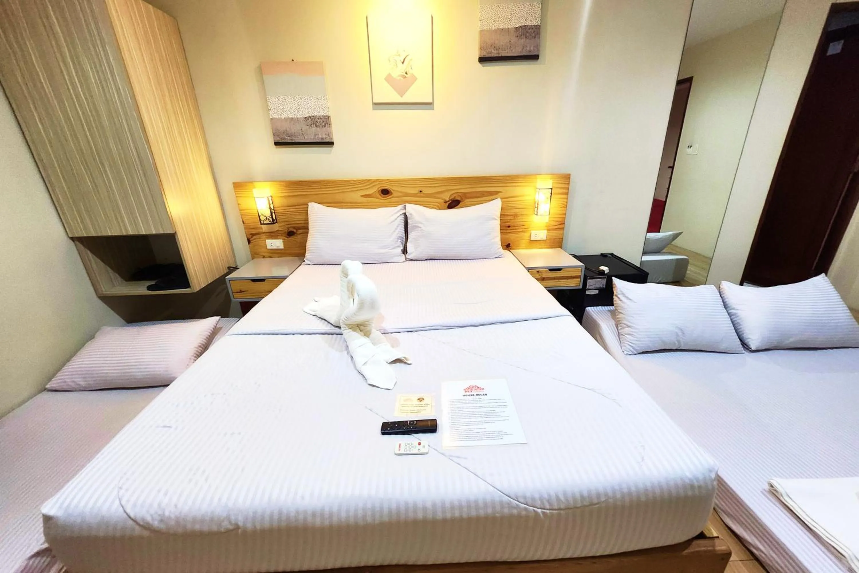 Bed in DLT Suites Cebu powered by Cocotel