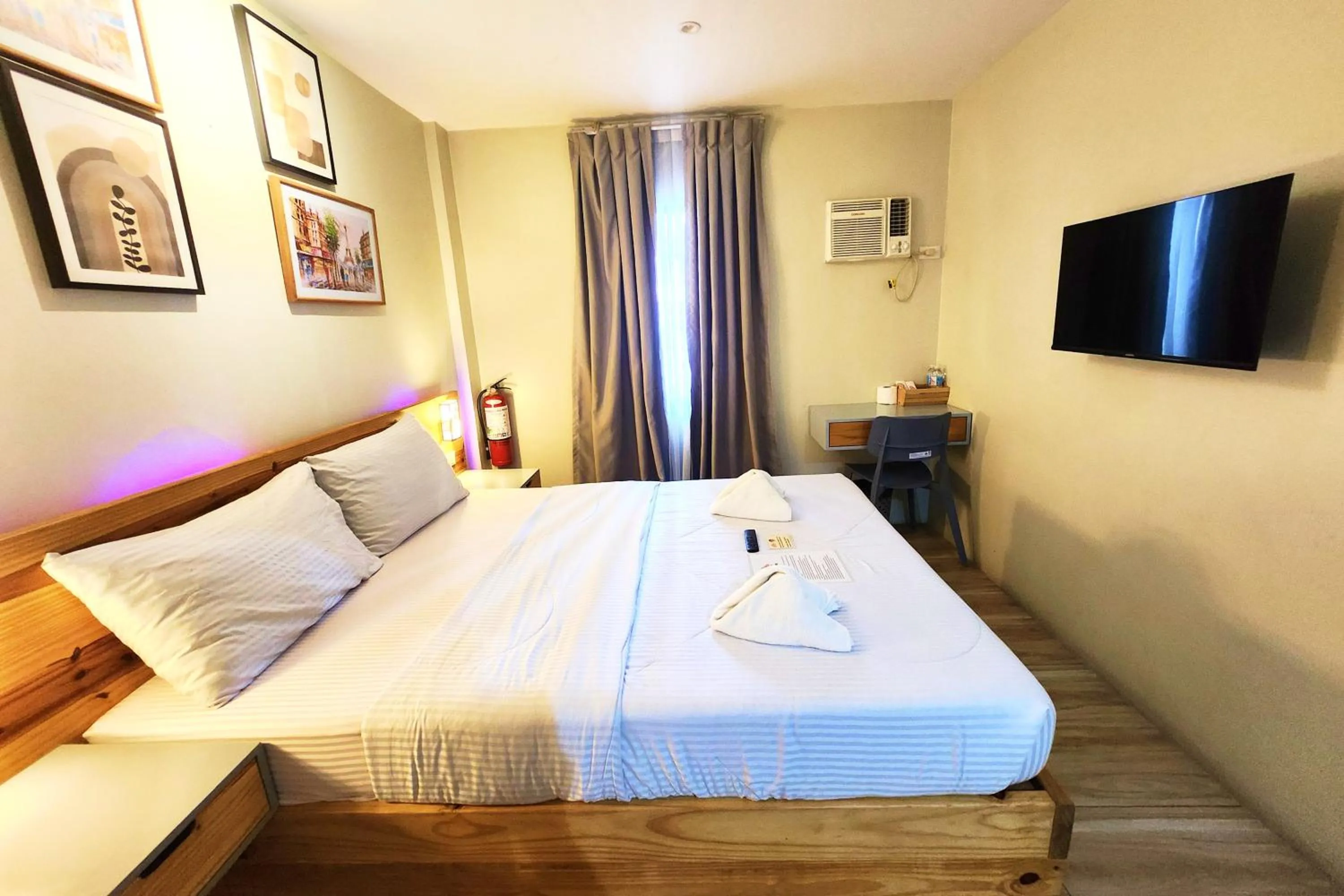 Bed in DLT Suites Cebu powered by Cocotel