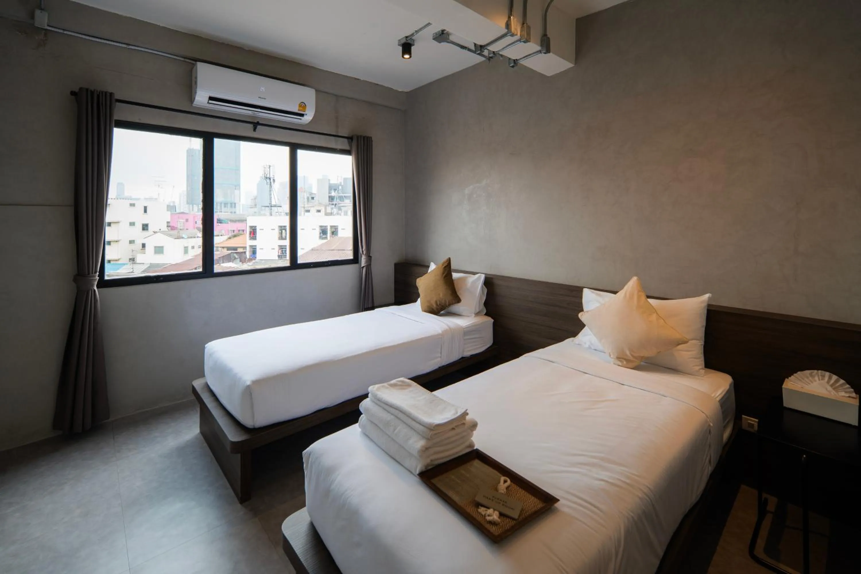 Bed in C'HOUSE Bangkok