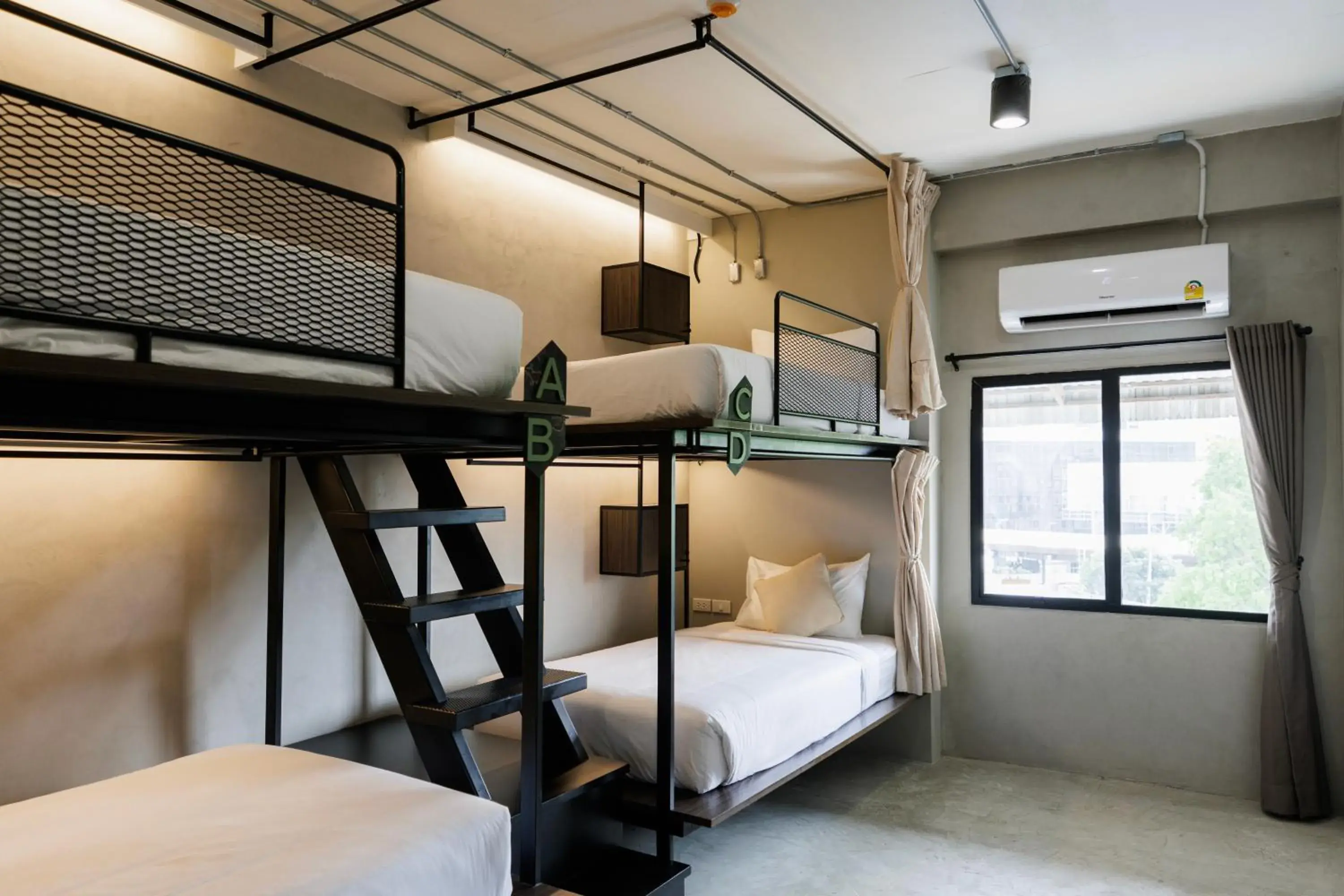 Bed in 4-Bed Mixed Dormitory Room in C'HOUSE Bangkok Bed in 4-Bed Mixed Dormitory Room in C'HOUSE Bangkok