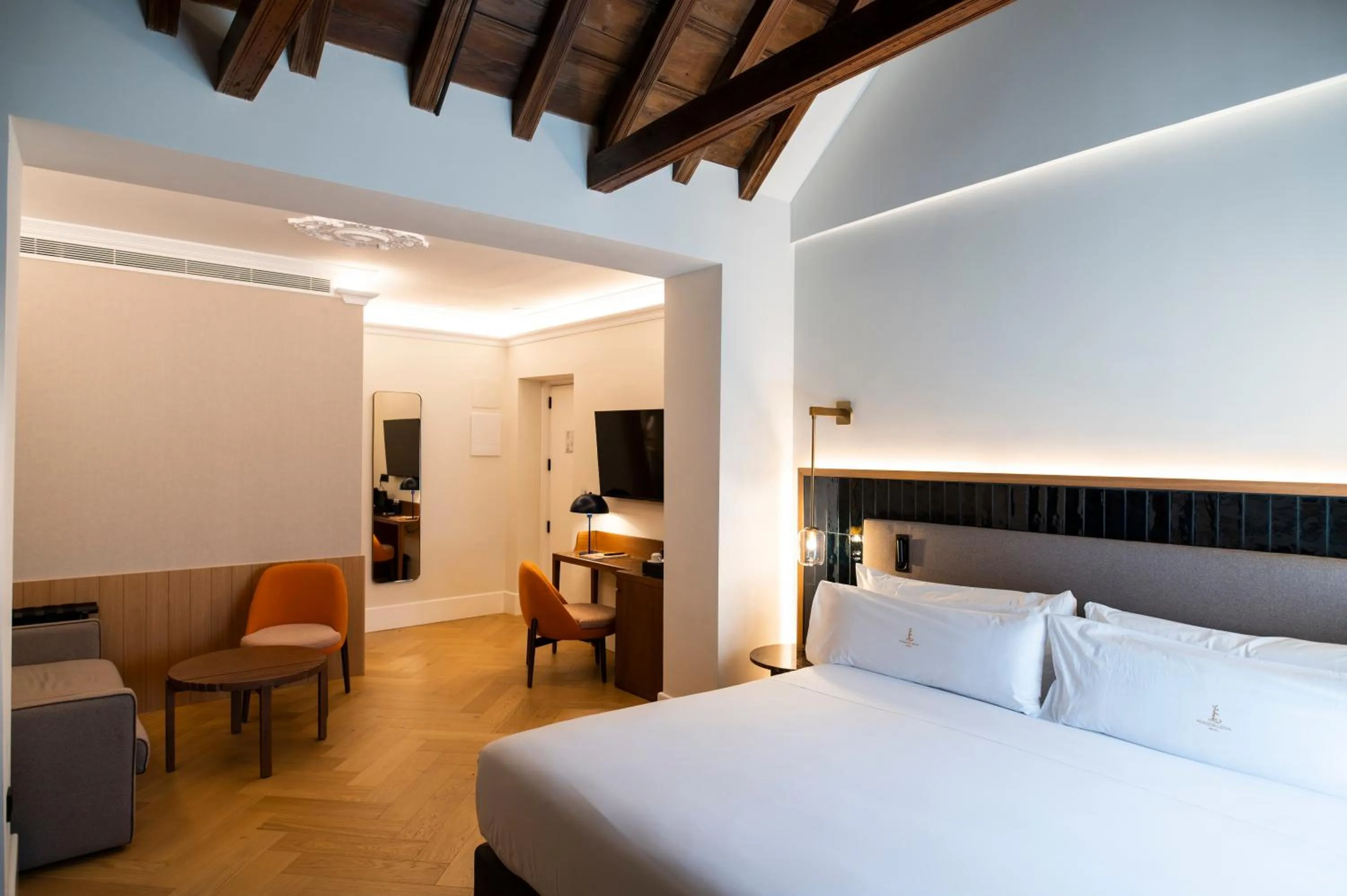 Seating area, Bed in Legado Magdalena Hotel