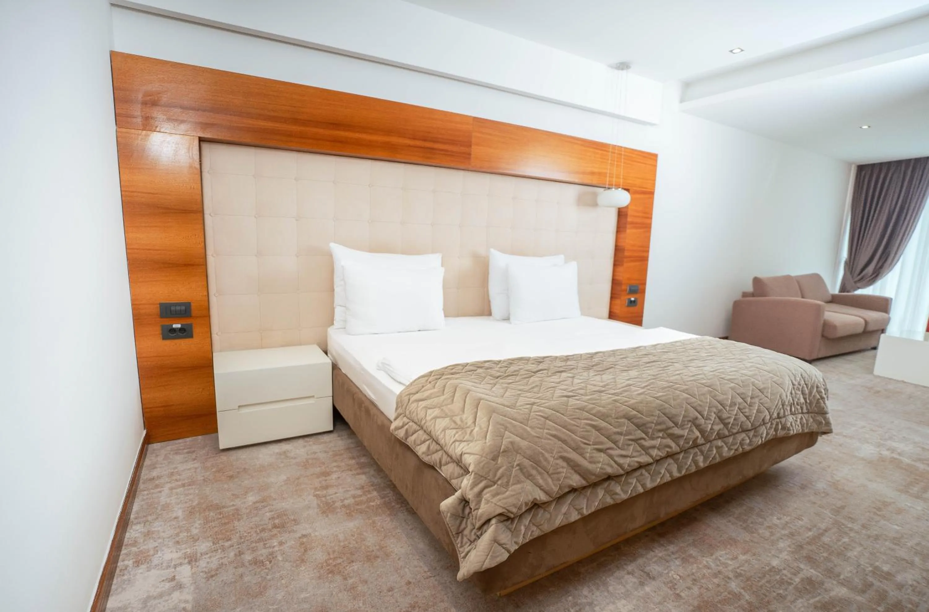 Bed in Garni Hotel Centar