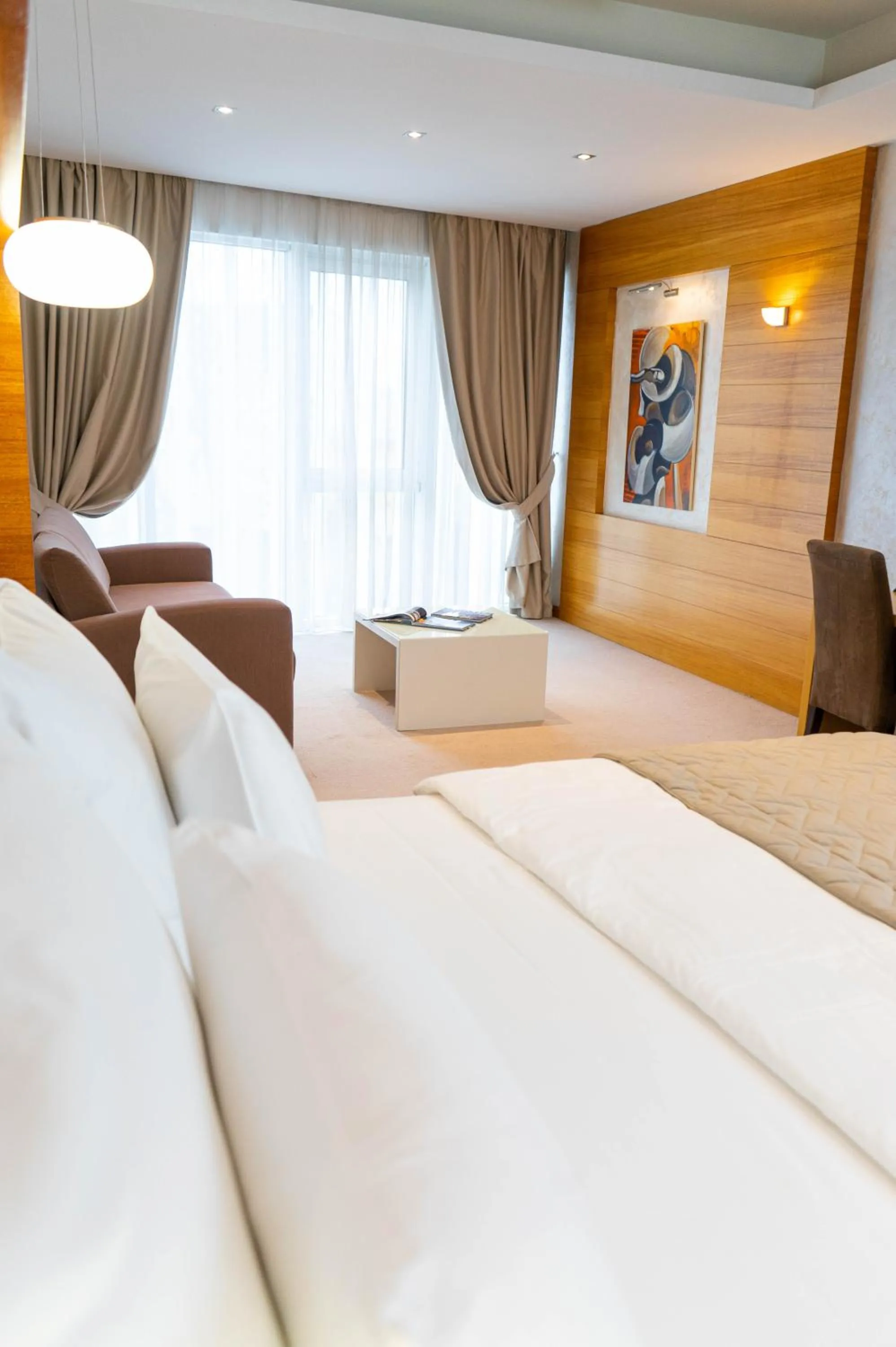 Seating area, Bed in Garni Hotel Centar